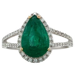 14k White Gold 3CT Pear Shape Emerald W/ Round Diamond Halo & Split Shank Ring