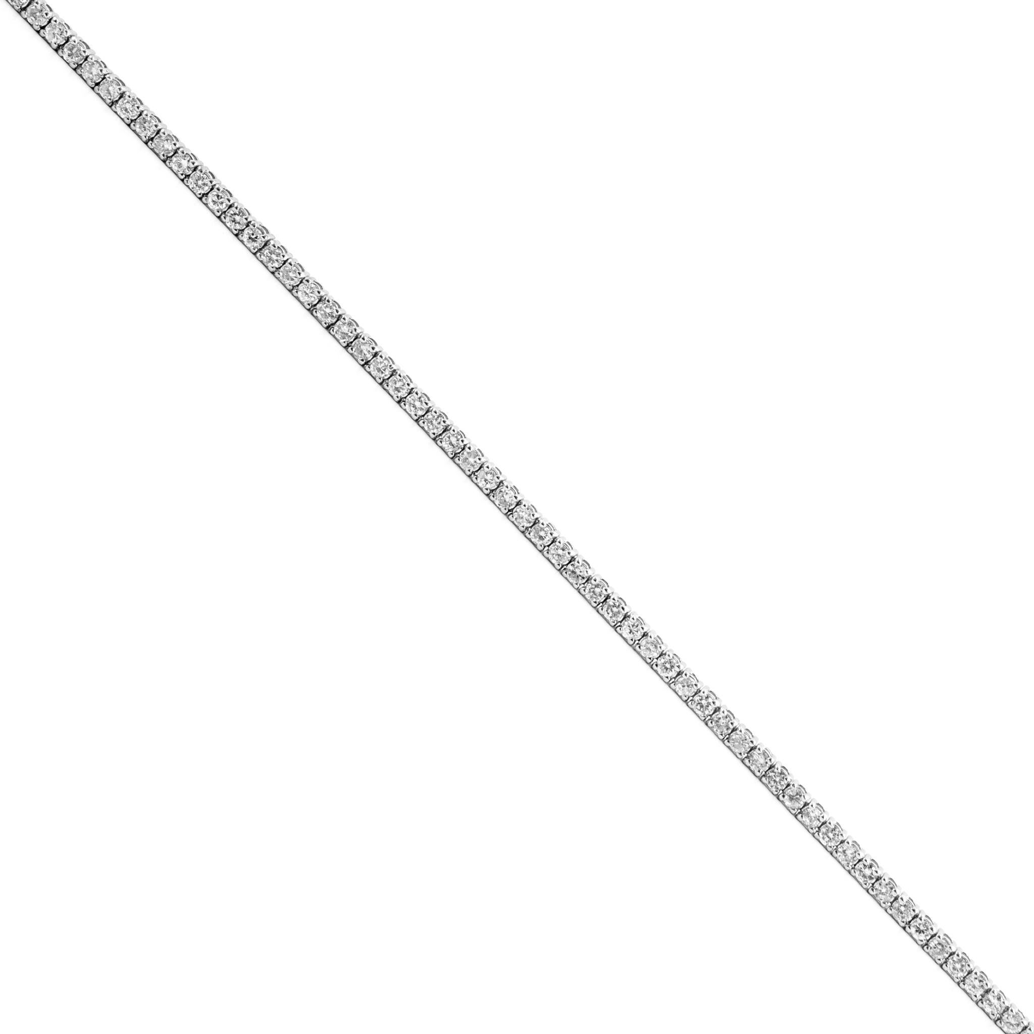 Metal Type: 14K White Gold

Length: 6.50 inches

Diameter: 2.00 mm

Weight: 5.37 grams

14K white gold diamond tennis bracelet. The metal was tested and determined to be 14K white gold. Engraved with 
