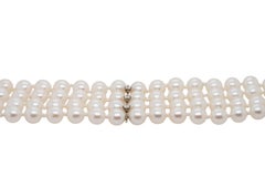 14k White Gold 4 Strand Pearl and Natural Diamond Bracelet