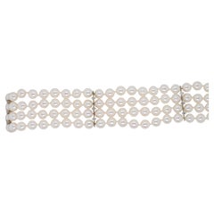 14k White Gold 4 Strand Pearl and Natural Diamond Bracelet