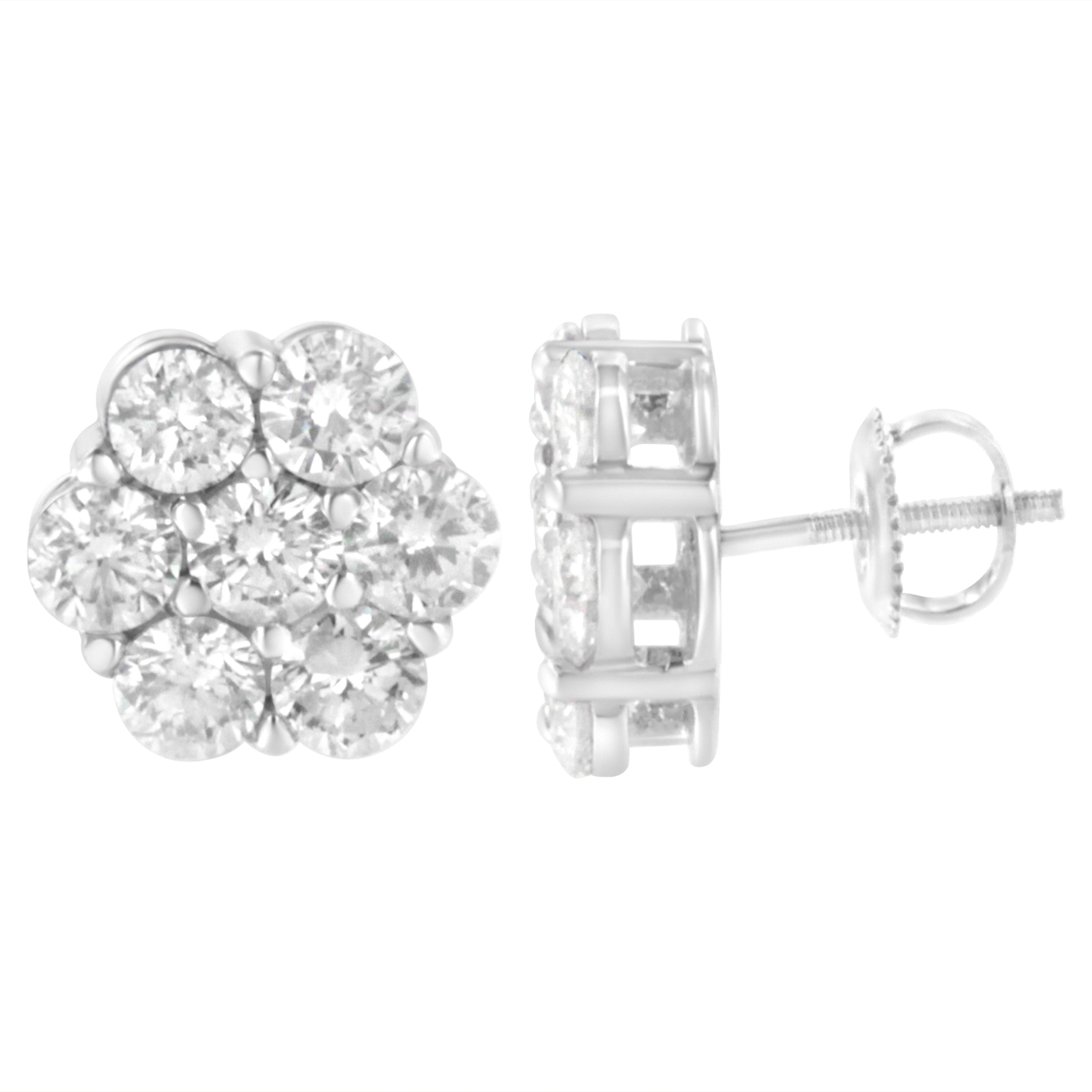 Treat yourself with this fantastic pair of chic and versatile 4 ct tdw floral stud earrings. It features 14 round shaped diamonds encased in 14k white gold with superb detailing's. The classic prong setting secures the diamonds and lends the