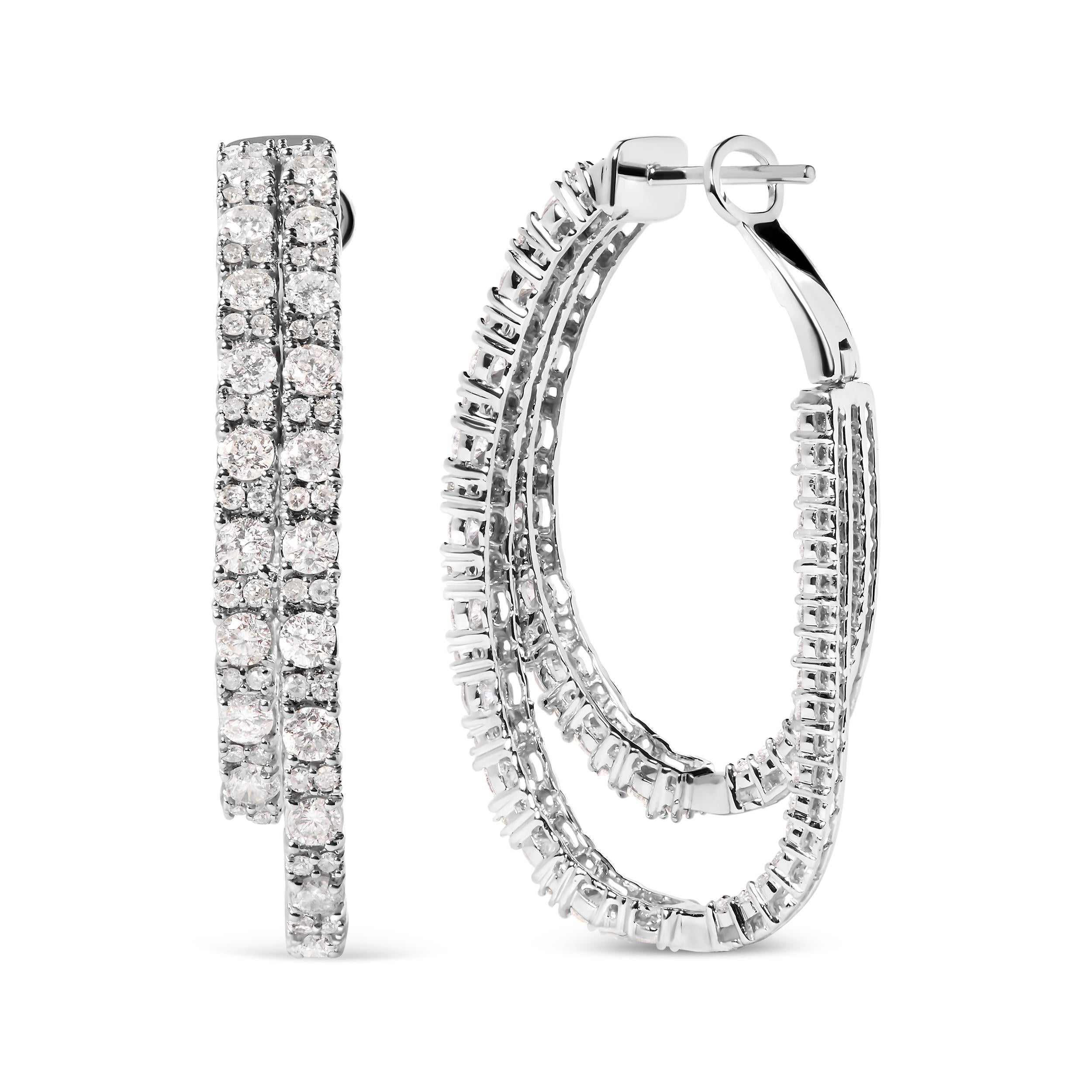 Indulge in the exquisite allure of these captivating 14K White Gold Diamond Asymmetrical Inside Out Double-Hoop Earrings. Crafted with meticulous precision, these dazzling earrings showcase a remarkable total weight of 4.0 cttw, with 188 round-cut