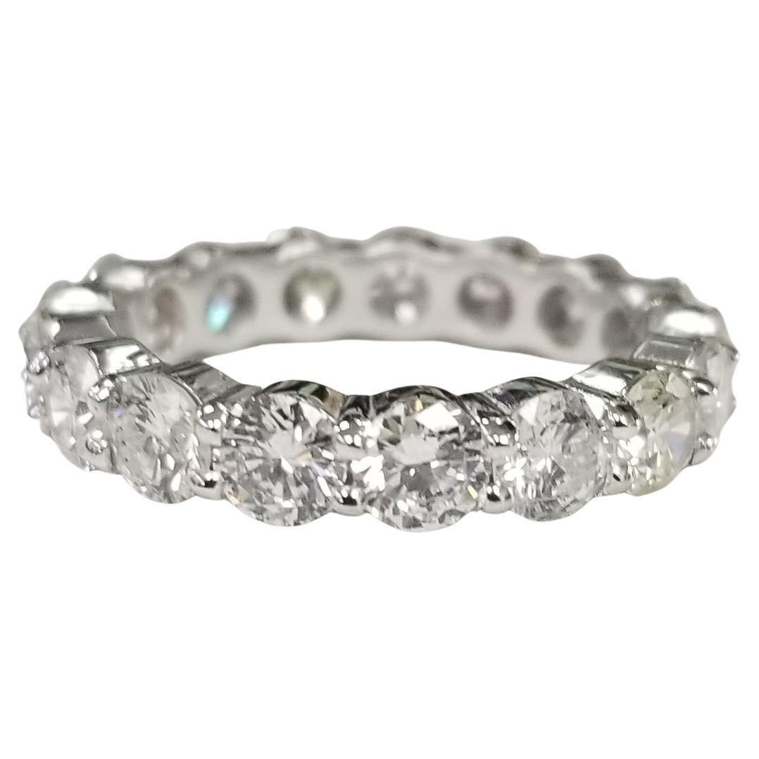 14k white gold 4.08 Carats Diamond Eternity Ring Set with Shared Prongs For Sale