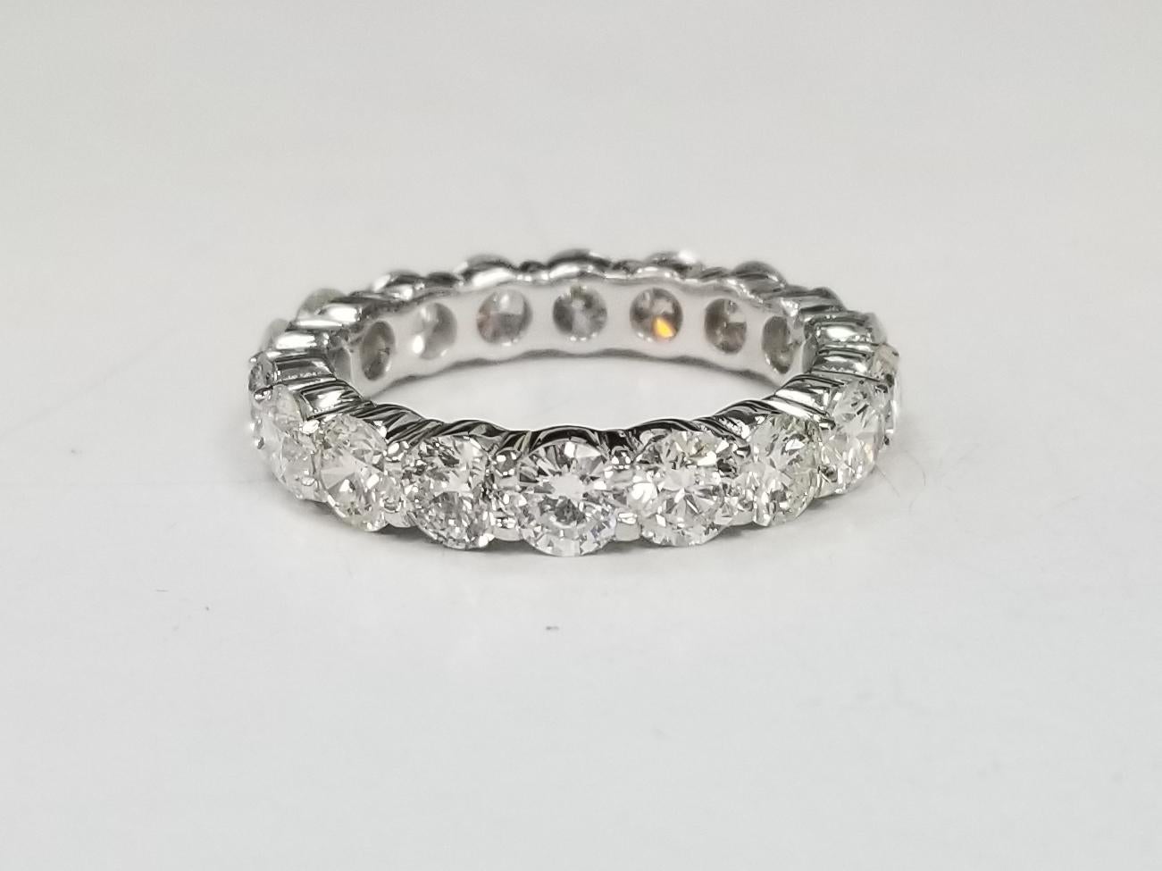 Women's or Men's 14k White Gold 4.25 Carats Diamond Eternity Ring Set with Shared Prongs For Sale