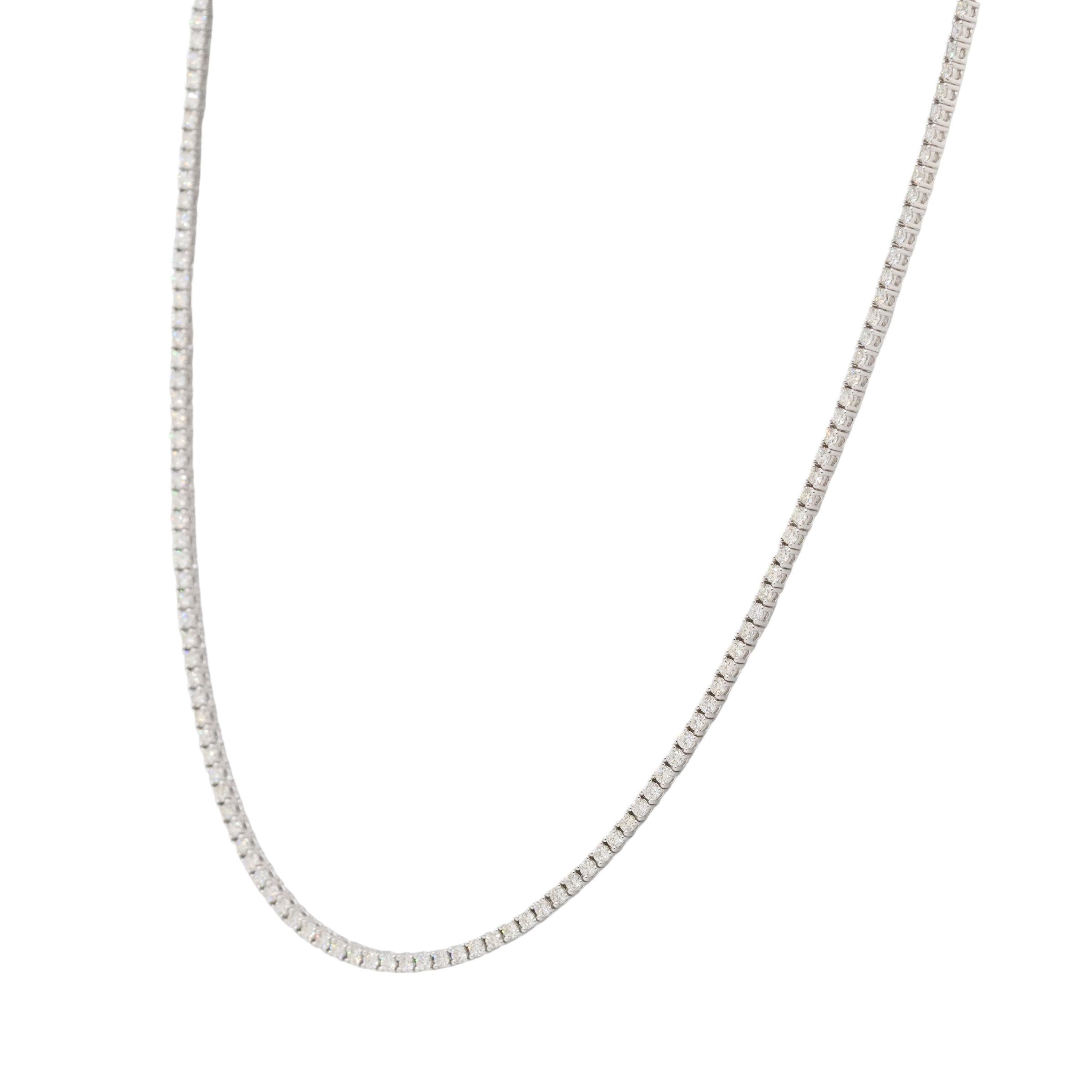 This 14k White Gold Round Natural Diamond Prong-Set Tennis Necklace is the pinnacle of beauty. This stunning necklace, which has a superb total diamond weight of 4.65 carats, features round diamonds that are a brilliant G to H in color and