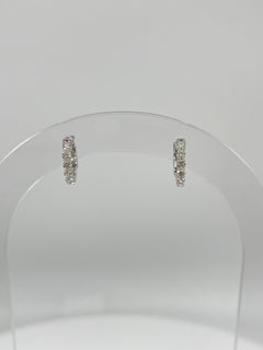 Boucles d'oreilles Huggie en or blanc 14K avec diamants de 0,47 CTW