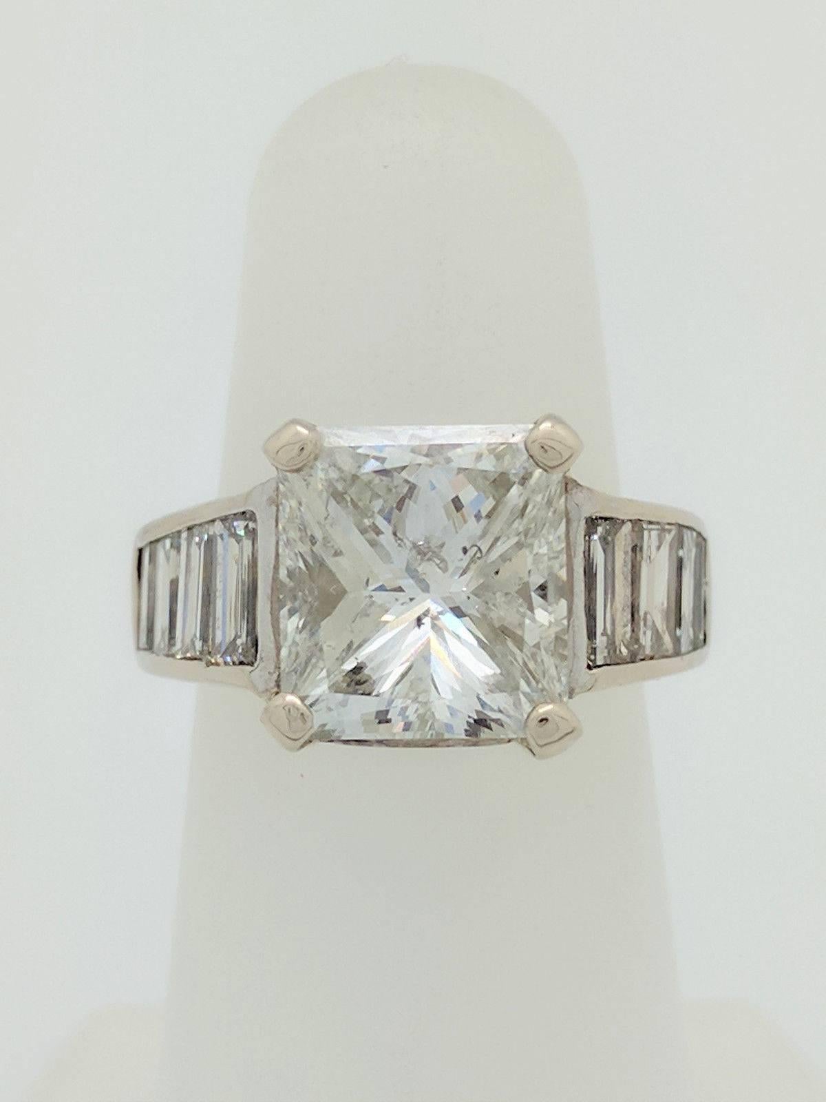 14K White Gold 4.80ct Princess Cut Diamond Engagement Ring I1/G
 
You are viewing a beautiful 4.80ct natural princess cut diamond. We estimate this diamond to be I1 in clarity and G in color. The diamond is beautifully displayed in a 14k white gold