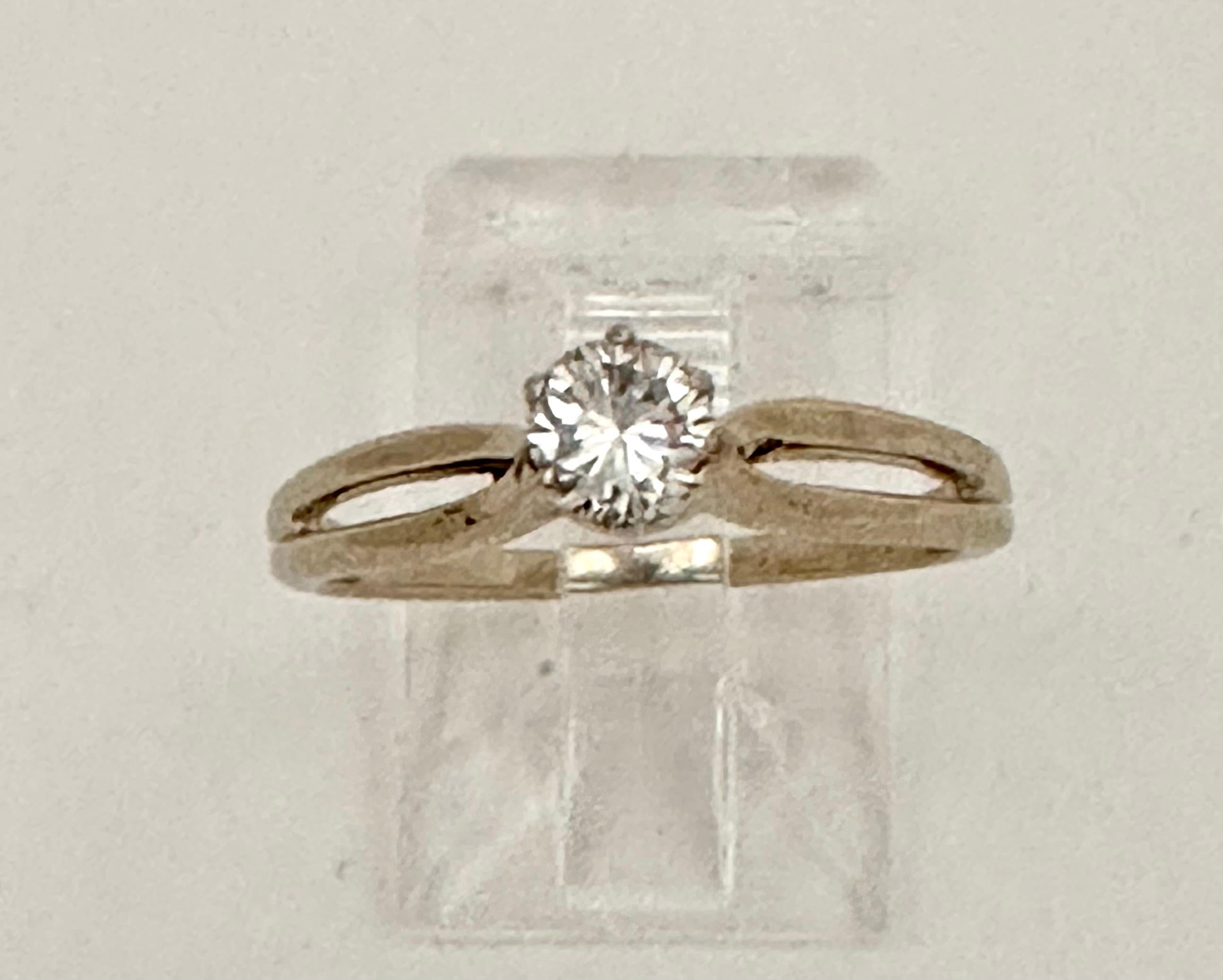 14k White Gold ~ 4mm Round approx. .25ct Diamond ~ Ring ~ Engagement Ring ~ Size 6
A real sparkler ! 

When you contemplate the rarity and purity of diamonds (plus the billions of years it takes to make one), it is no surprise that the stones have
