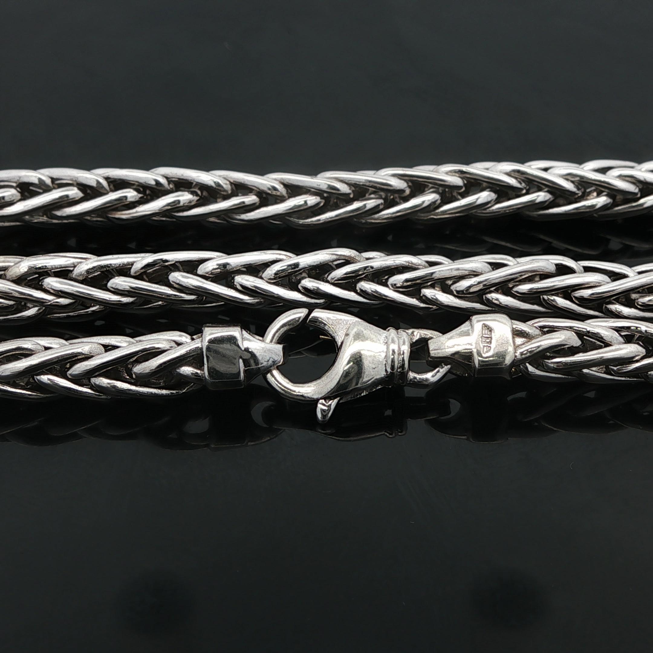 Material: Solid 14k White Gold
Weight: 48.76 Grams
Chain Type: Wheat Link
Chain Length: 24