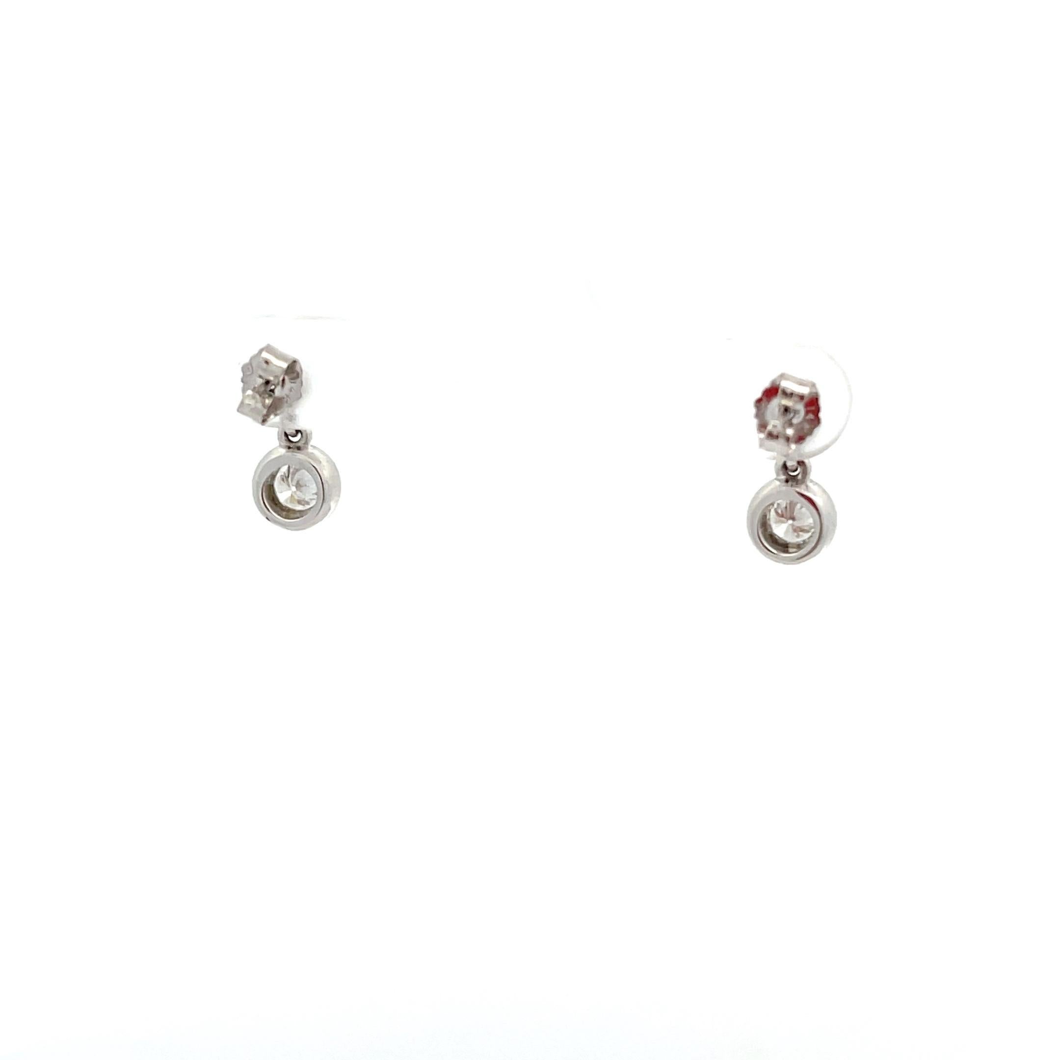 Modern 14K White Gold 5/8ctw Diamond Bezel Drop Earrings For Sale