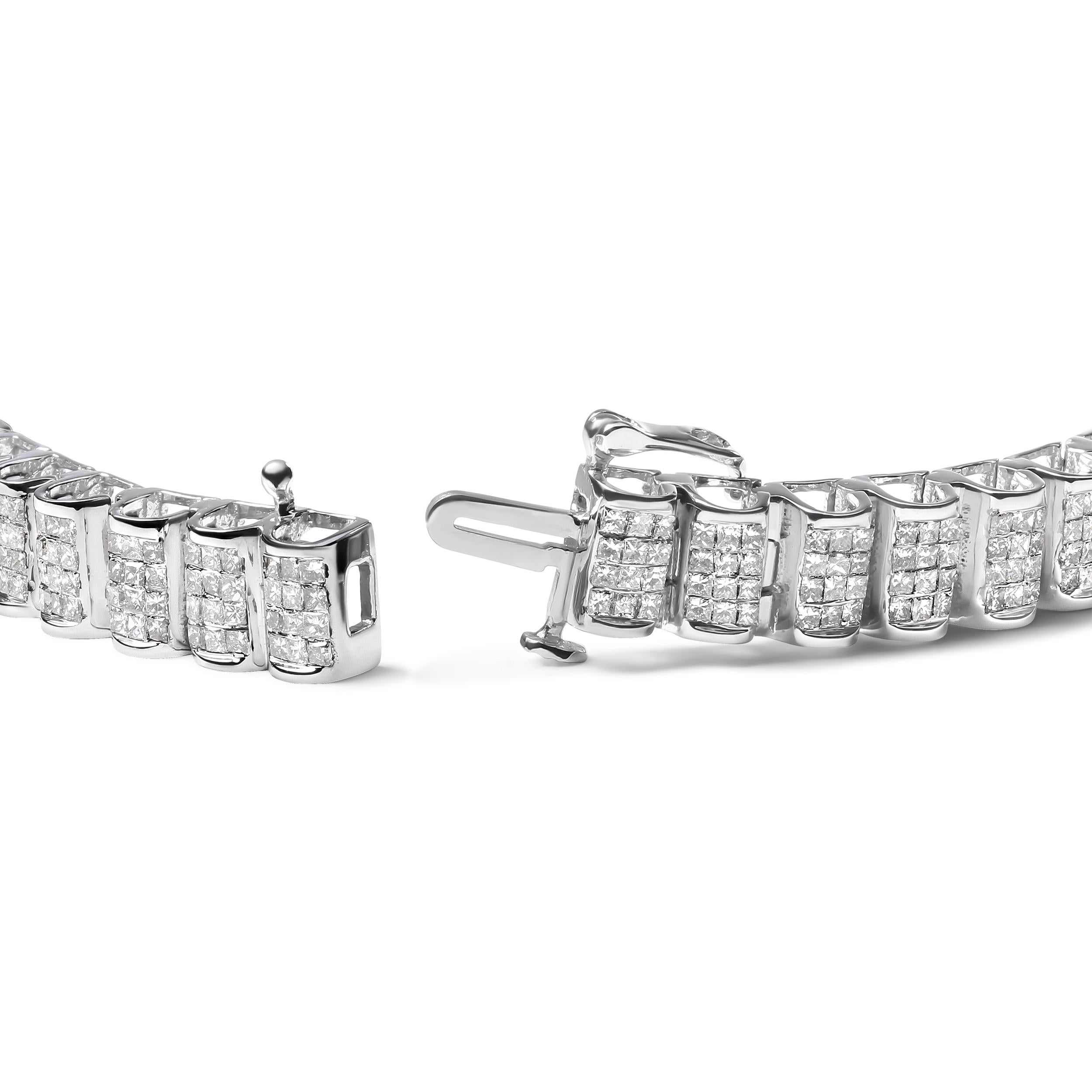 Celebrate a special moment with this exquisite and sparkly white diamond tennis bracelet. This elegant bracelet features hinged rectangular links featuring grids of square princess cut white diamonds in invisible settings. D or bridge shaped guards