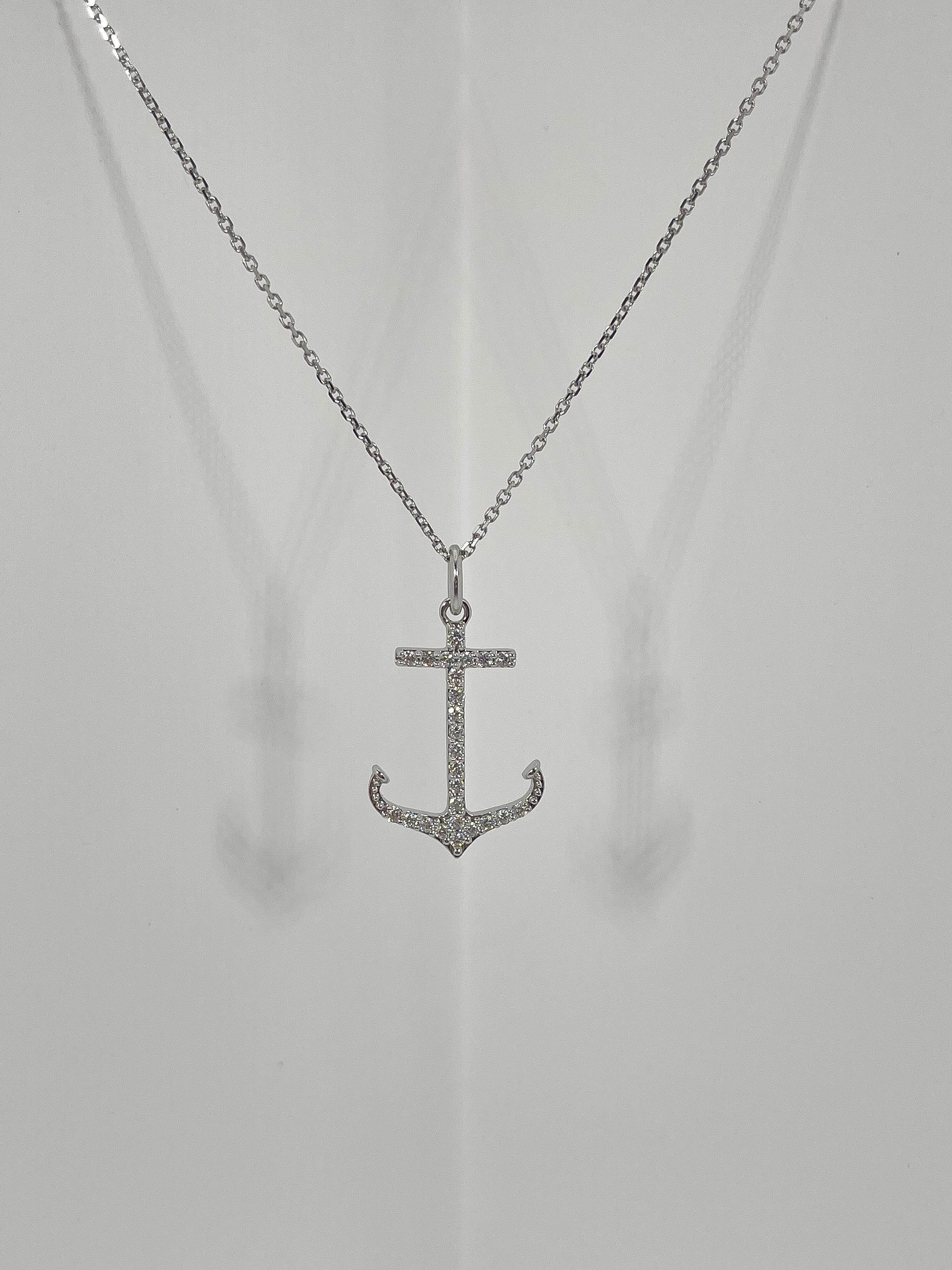 14k white gold .50 CTW diamond anchor pendant necklace. The pendant comes on an 18 inch cable chain, has a measurement of 27.7 x 18.5 mm, and the total weight of the necklace is 4.3 grams