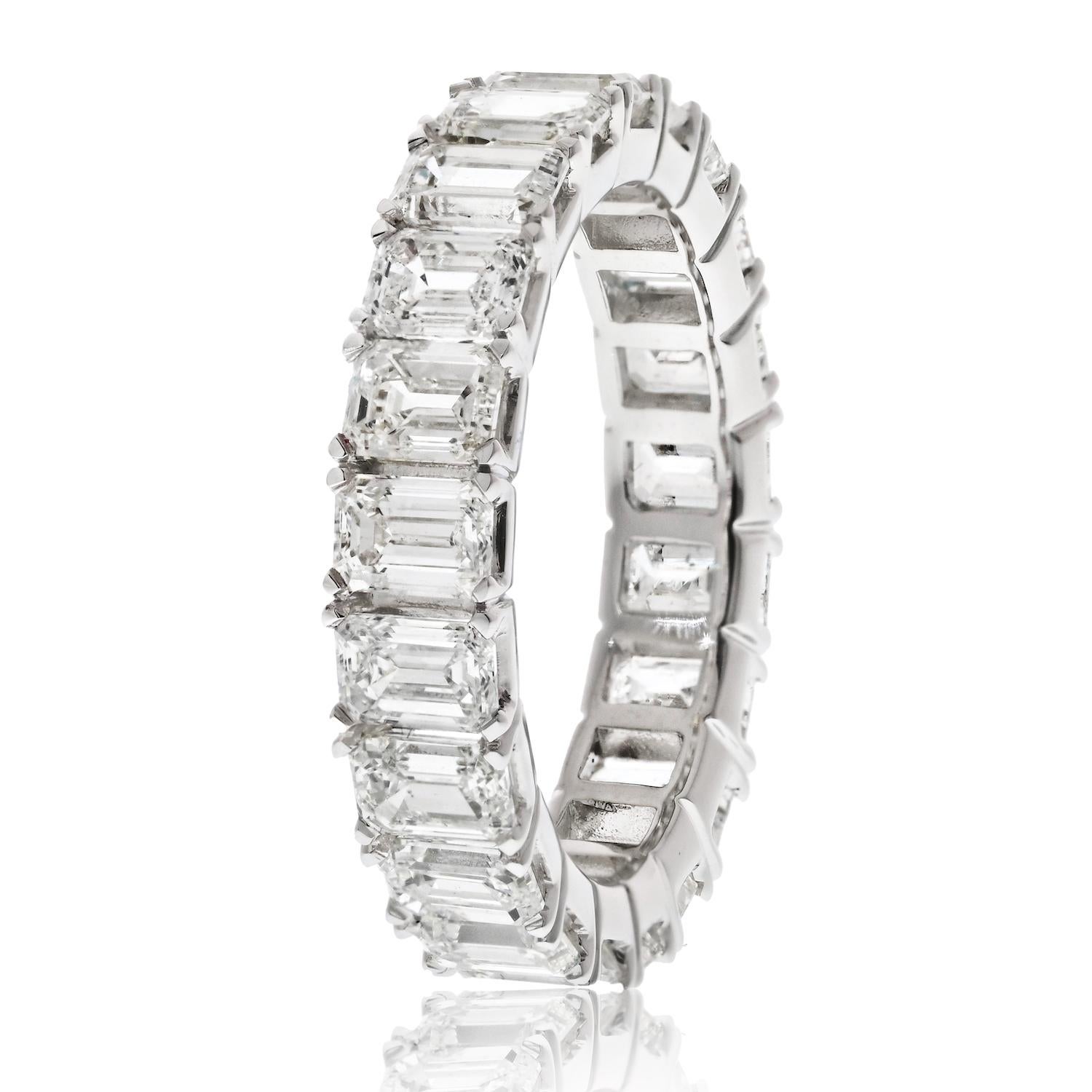 Elevate your style with our exquisite Classic Diamond Eternity Band, adorned with emerald-cut diamonds totaling 5.00 carats. 

Meticulously crafted in 14K white gold, this timeless piece is designed for a size 7 fit and boasts a gracefully low-set