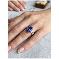 14K White Gold 5.50ct Oval Tanzanite & Diamond Split Band Ring
