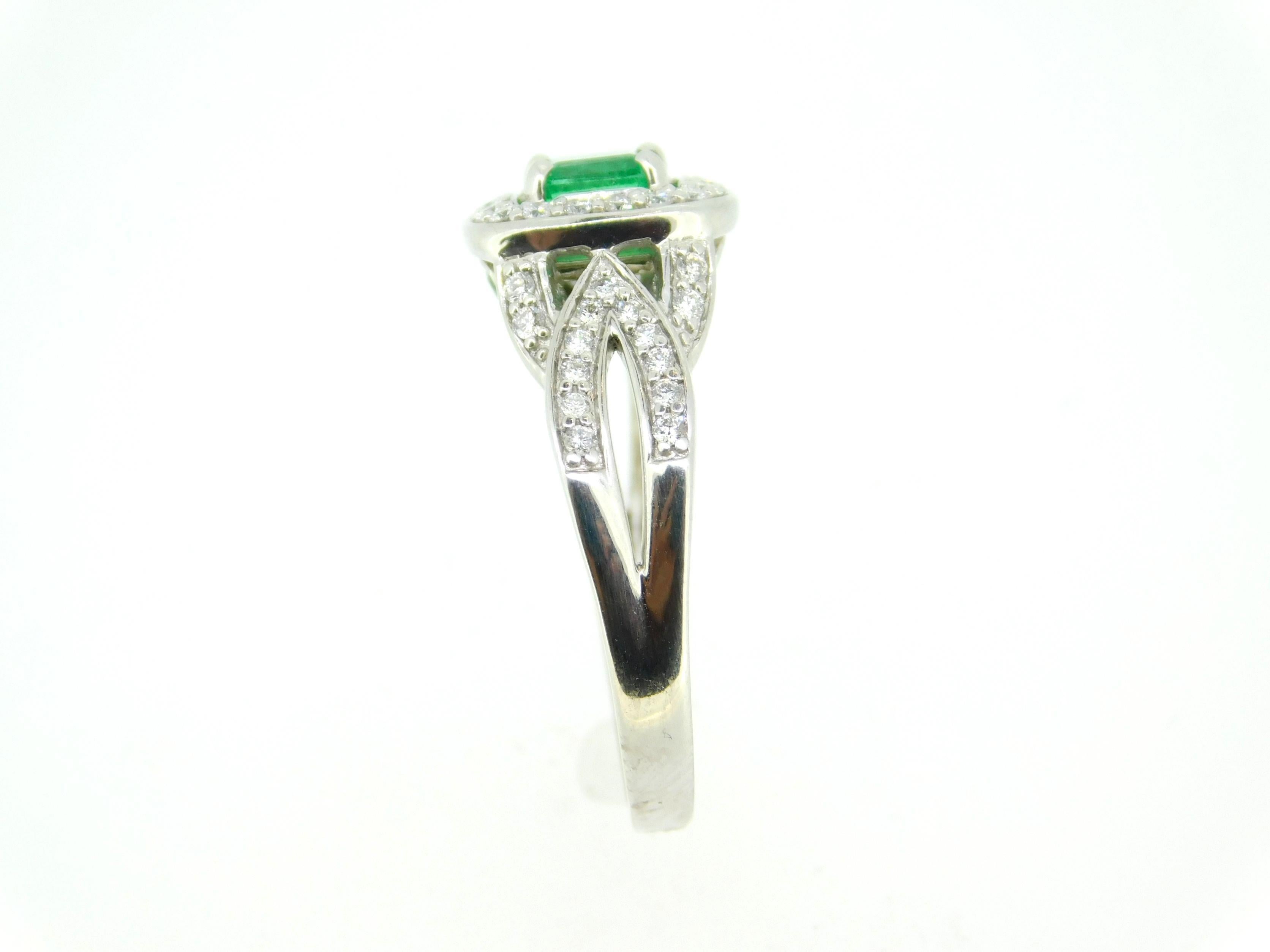 14k White Gold .56ct Genuine Natural Emerald and Diamond Halo Ring (#J5003)
14k white gold diamond and emerald ring featuring a square emerald weighing .56ct. It has bright grass green color and measures about 4.8mm. The emerald is accented by 1/2