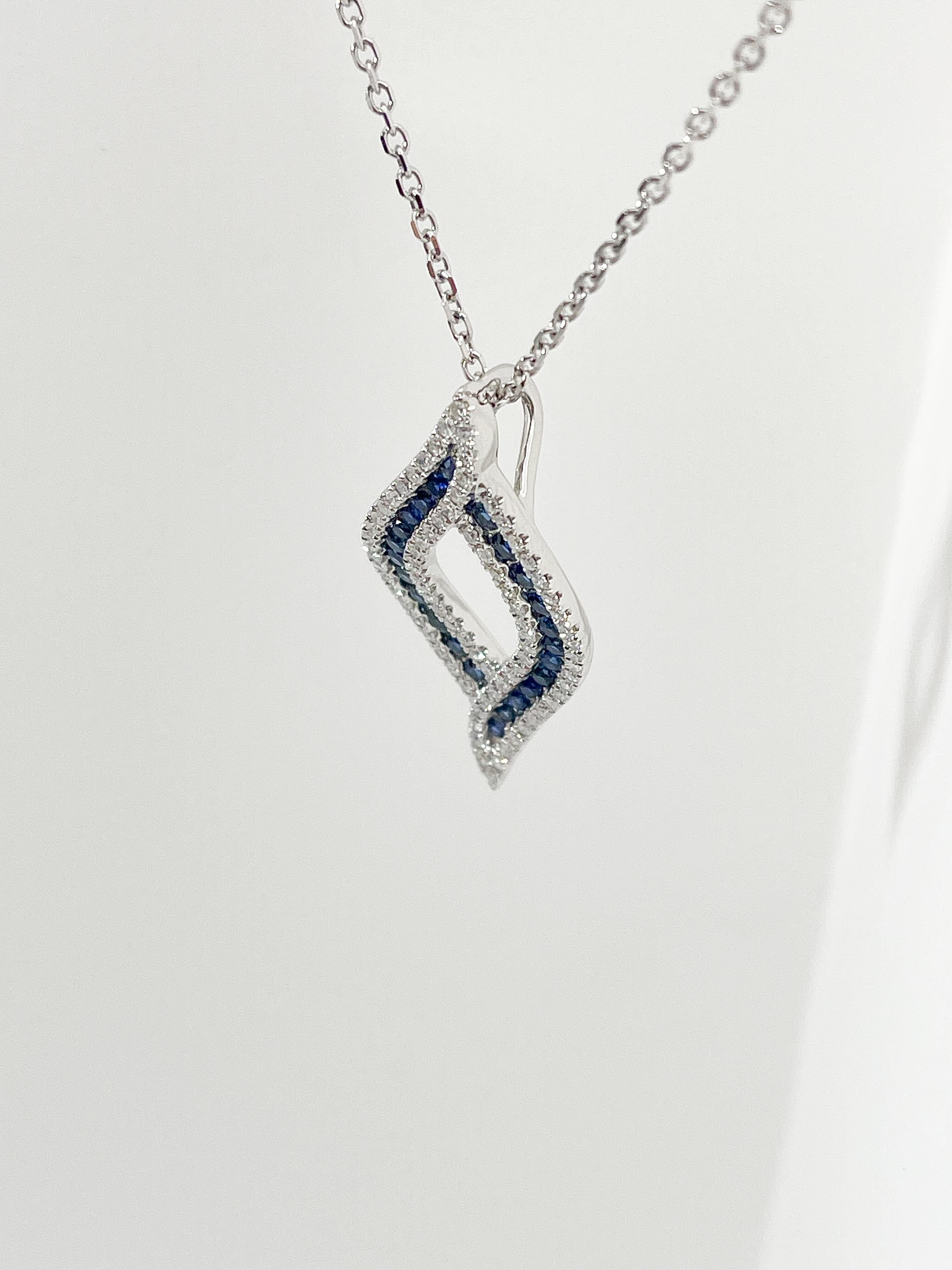 14K White Gold .57 CTW Diamond and .78 CTW Sapphire Pendant Necklace. In New Condition For Sale In Stuart, FL