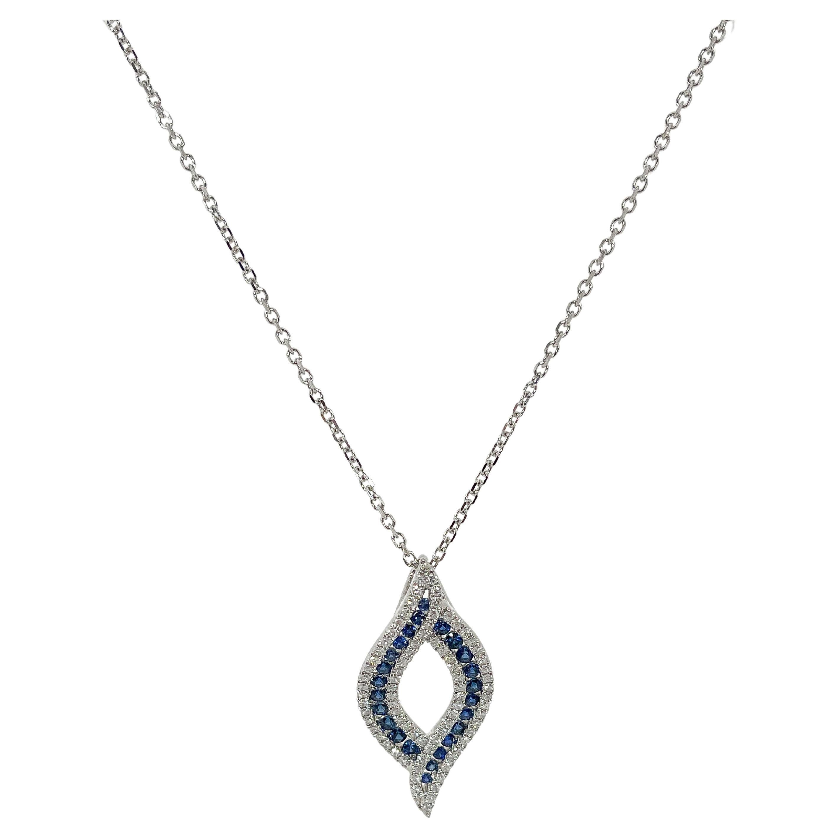 14K White Gold .57 CTW Diamond and .78 CTW Sapphire Pendant Necklace. For Sale