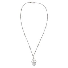 Collier pendentif Hamsa en or blanc 14 carats et diamants 585
