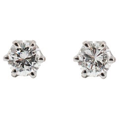Orecchini in oro bianco 14K a 6 punte con chiusura a vite con diamante rotondo da 0,55 carati