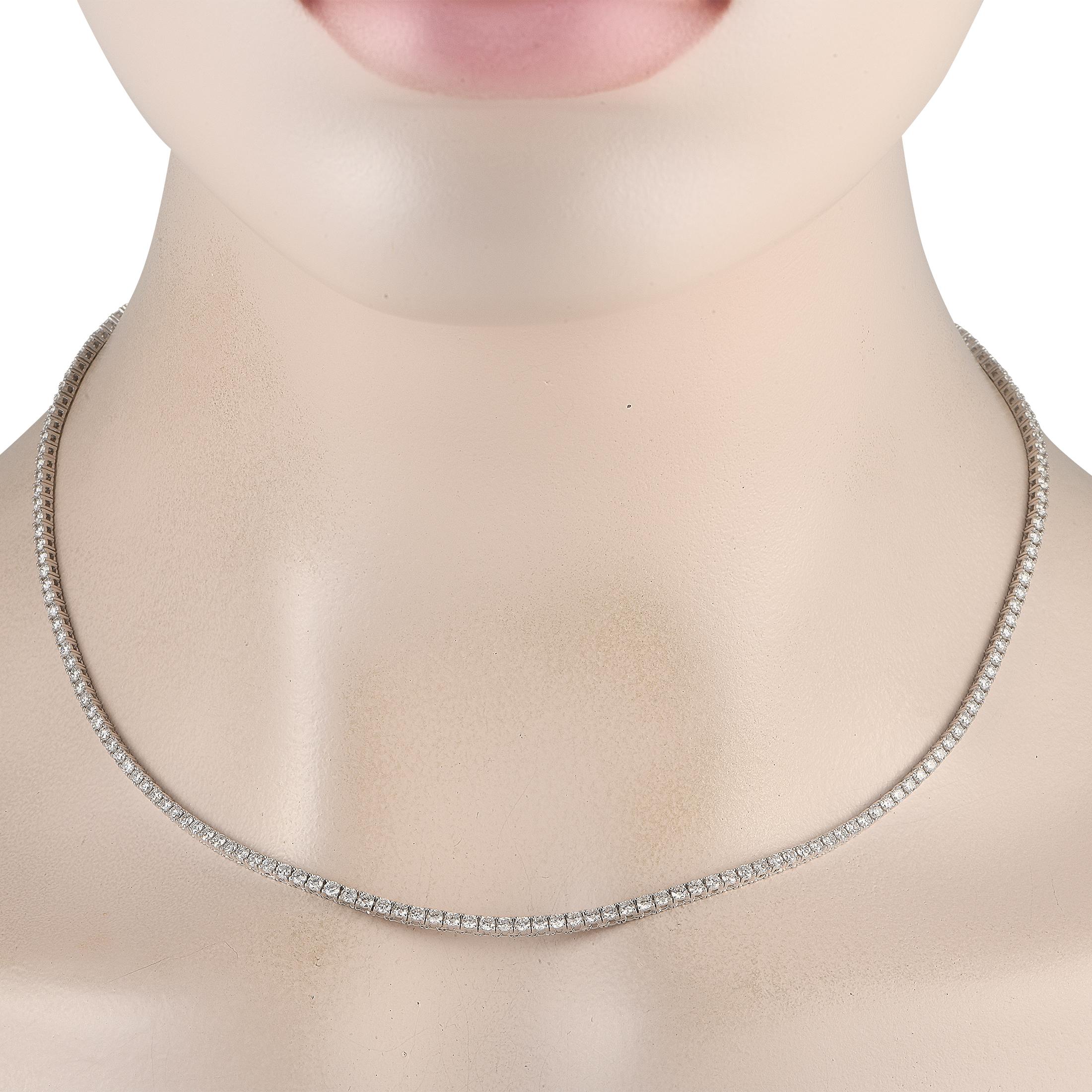 Make a glamorous style statement with this diamond tennis necklace. It features a graceful line of 6.01-carats round brilliant lab-grown diamonds, in E-F color grade and VVS2-VS1 clarity grade. Each of the 190 lab diamonds is mounted on a 14K white