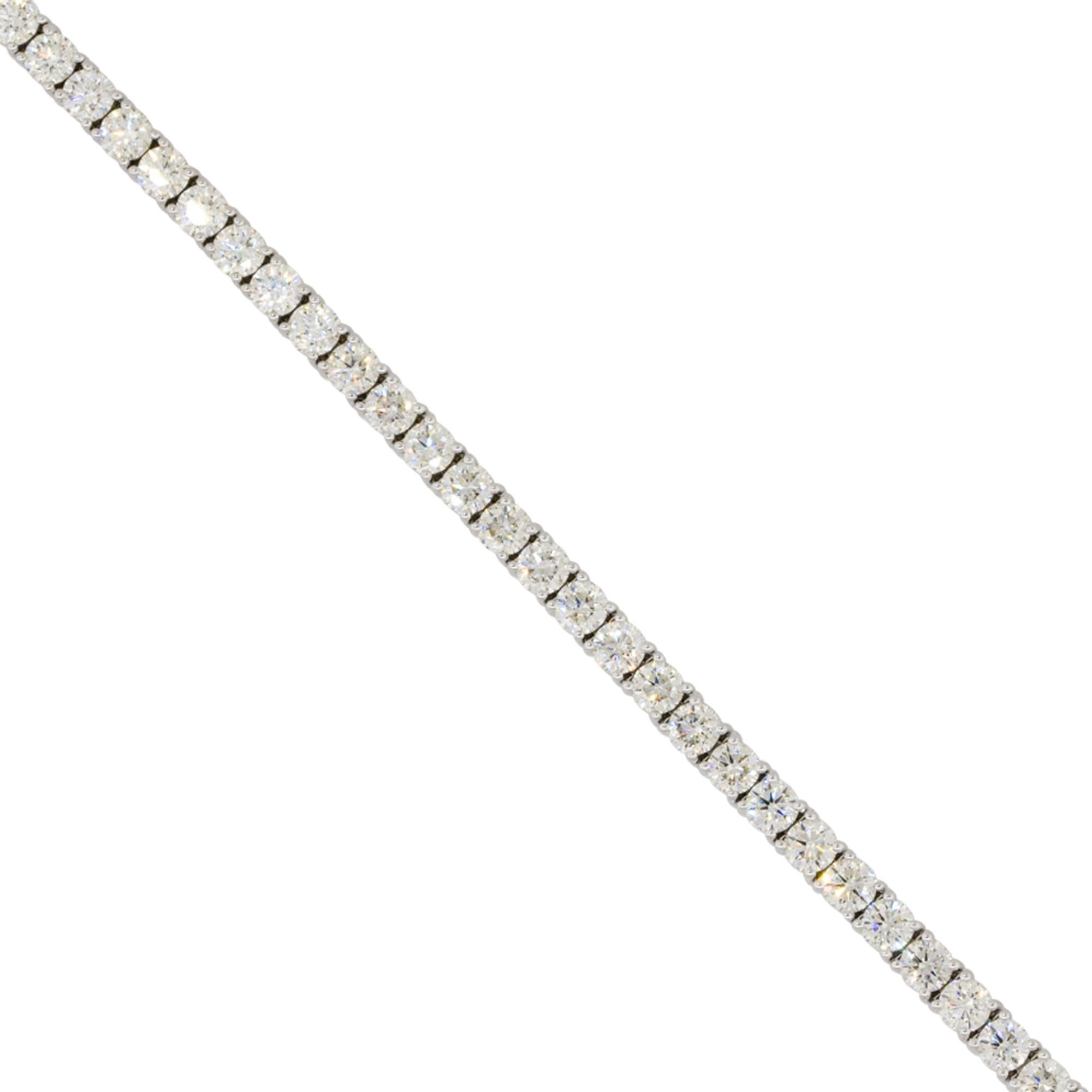 Material: 14k White Gold
Diamond Details: Approx. 6.38ctw of round brilliant Diamonds. Diamonds are G/H in color and VS in clarity
Clasps: Tongue in box clasp with safety latch
Total Weight: 11.2g (7.2dwt)
Length: 7