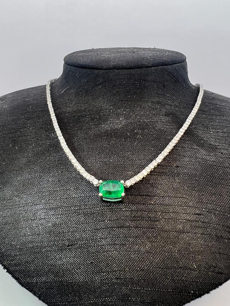 Oval Cut 14k white gold 6.3crt diamond tennis choker necklace with 2.26crt vivid emerald For Sale