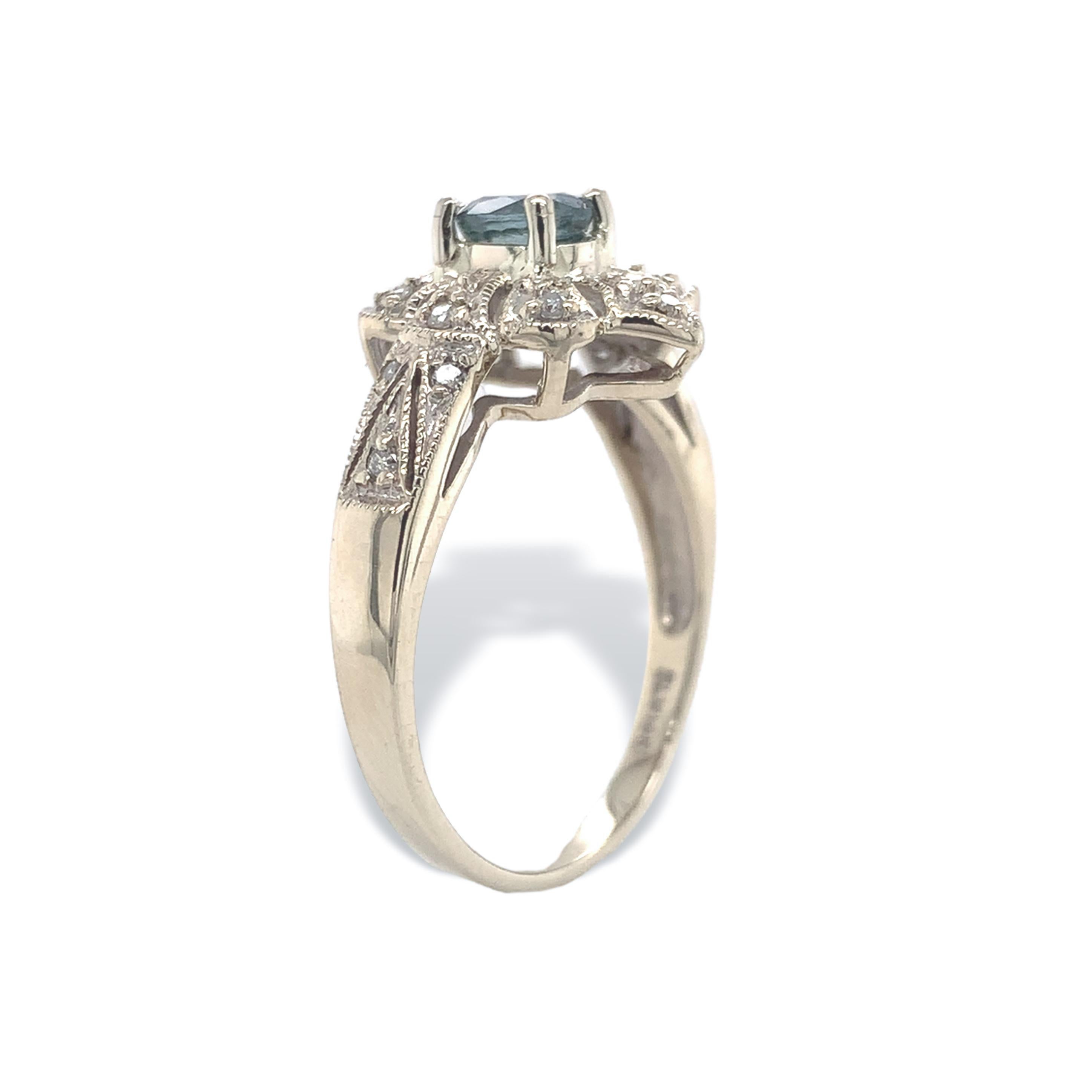 Anillo de oro blanco de 14 quilates .67ct Zafiro Montana Natural sin calentar Corte oval en venta