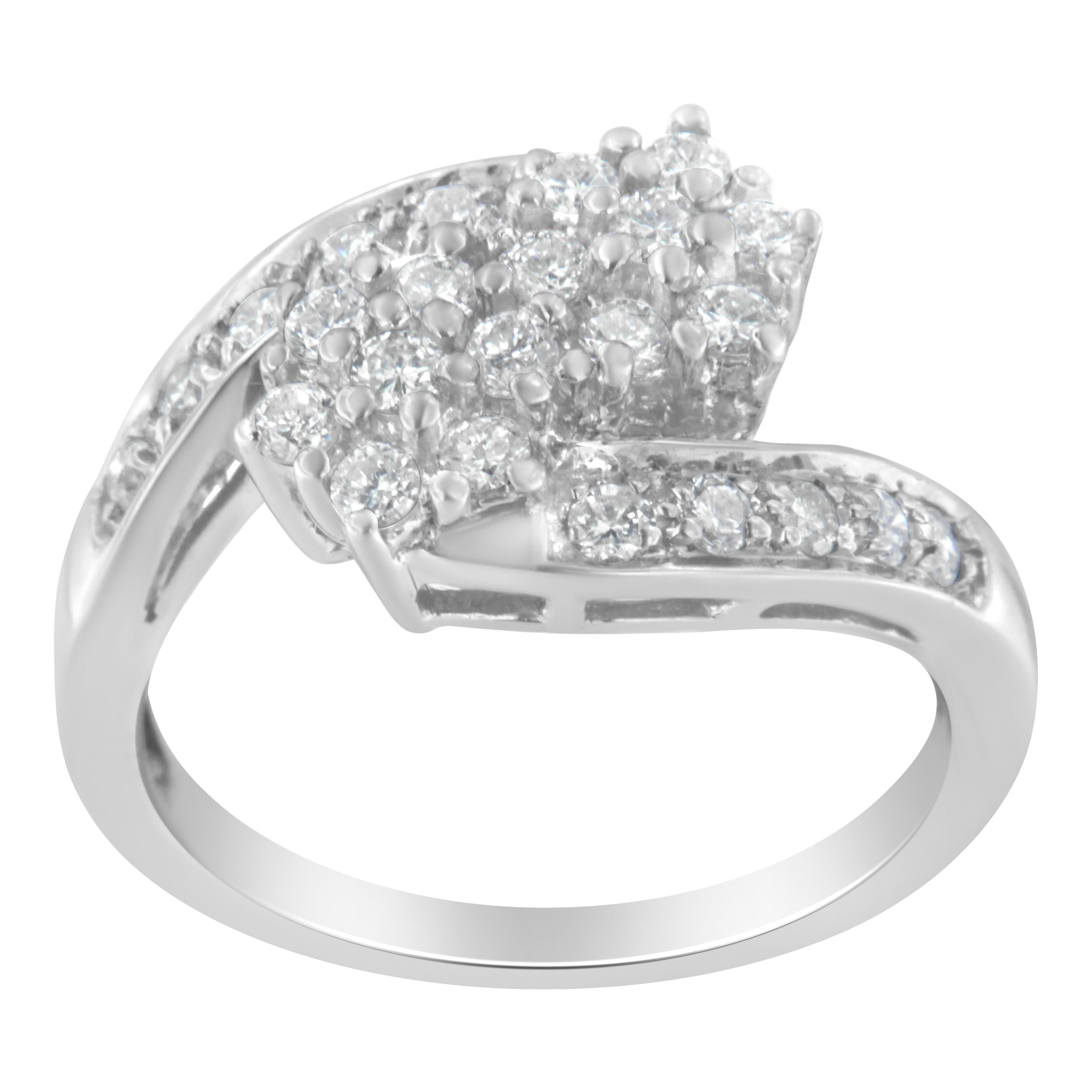 This stunning gold and diamond ring has a unique design, and beautiful, natural diamonds. The cluster ring has three rows of 24 round-cut diamonds set in lustrous 14k white gold. It has a total diamond weight of 7/8 ct. 

'Video Available Upon