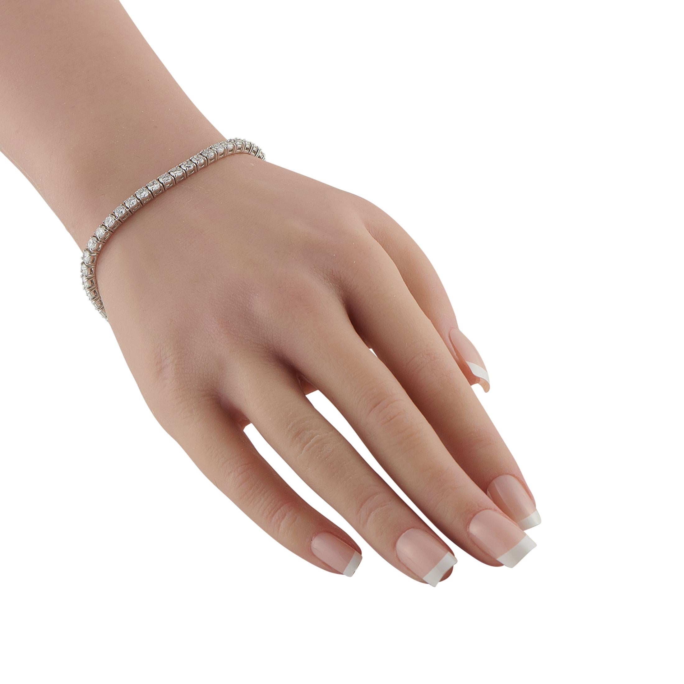 Set with 7.70 carats of diamonds, this bracelet gives a full, impressive sparkle that you can instantly see from across the room. The generous carat weight delivers both visual impact and long-term value. White gold keeps the look clean and modern,