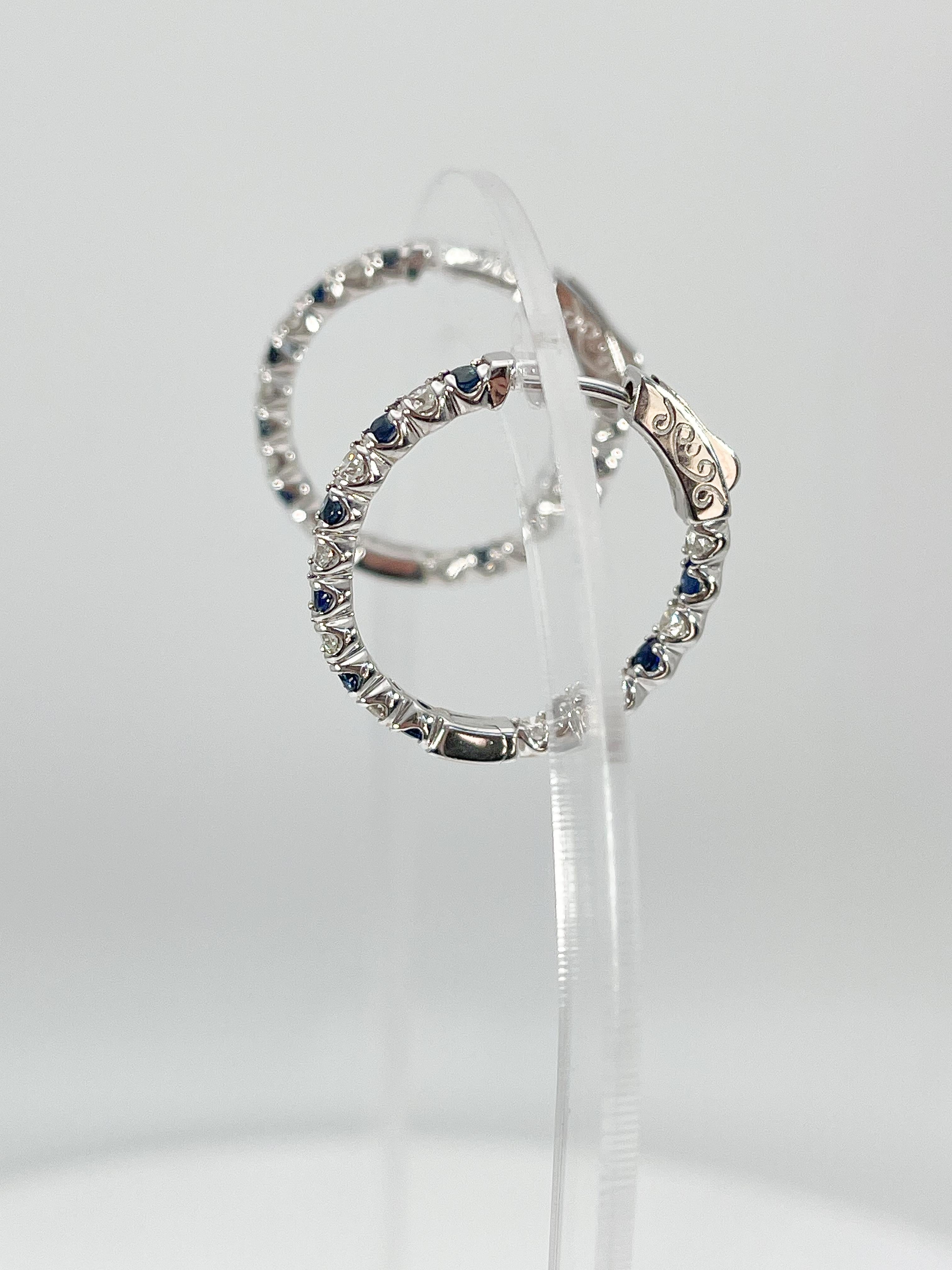 Round Cut 14K White Gold .79 CTW Diamond and 1.15 CTW Sapphire Hoop Earrings For Sale