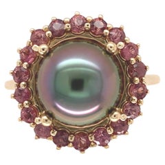 14K white gold 9.5mm Black Tahitian Pearl and Raspberry Sapphire Ring