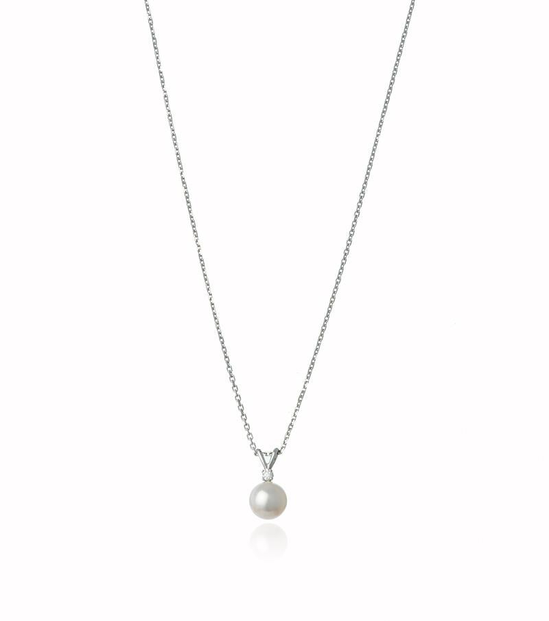 Add effortless glamour to your look with this Akoya Pearl and Diamond Pendant.
This classic silhouette is a timeless piece to invest in.

The .05 point diamond is elegantly set in a 4 prong 14k White Gold setting creating just the perfect amount of