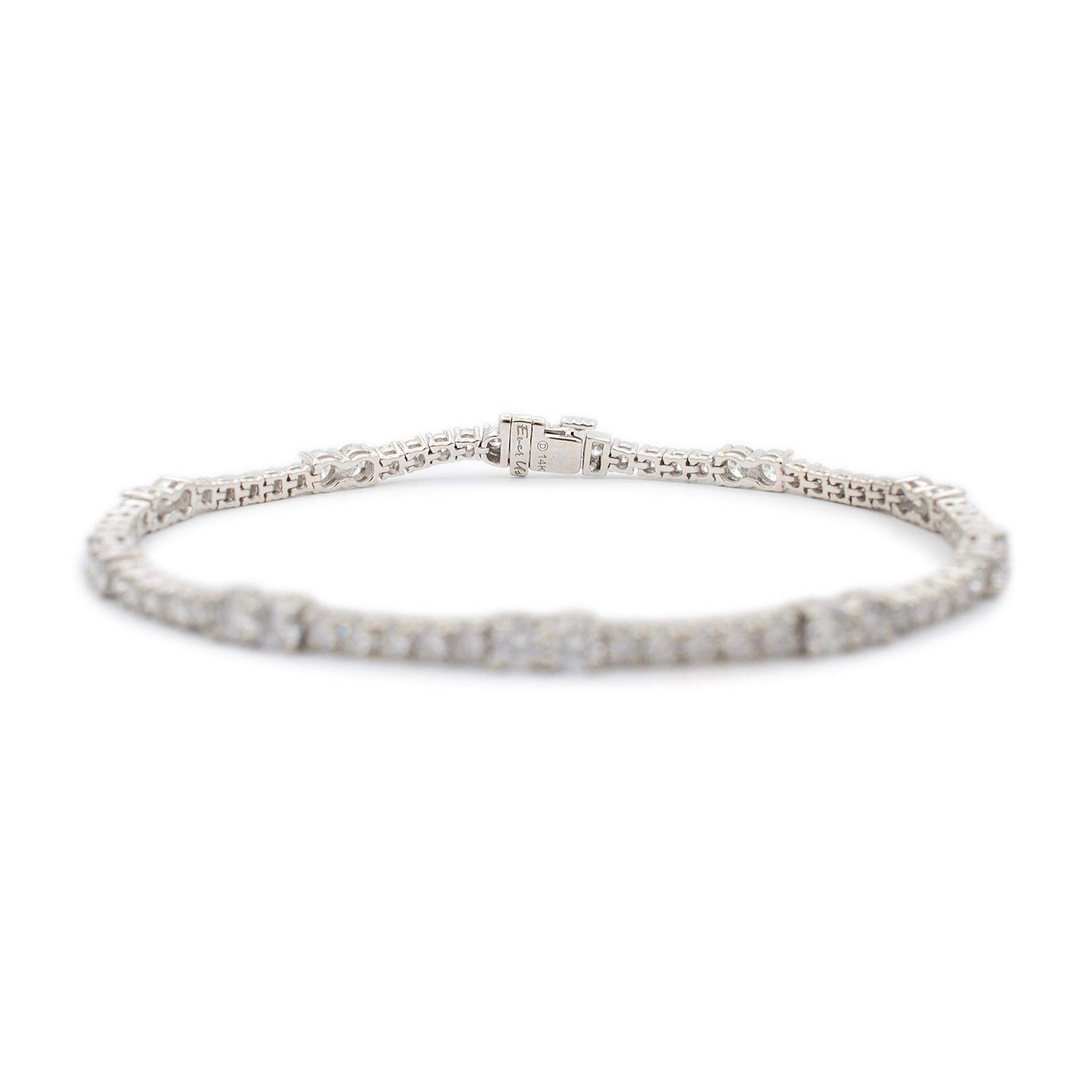 Metal Type: 14K White Gold

Length: 7.50 inches

Width: 3.30 mm

Weight: 10.10 grams

Alternate design diamond tennis bracelet. The metal was tested and determined to be 14K white gold. Engraved with 