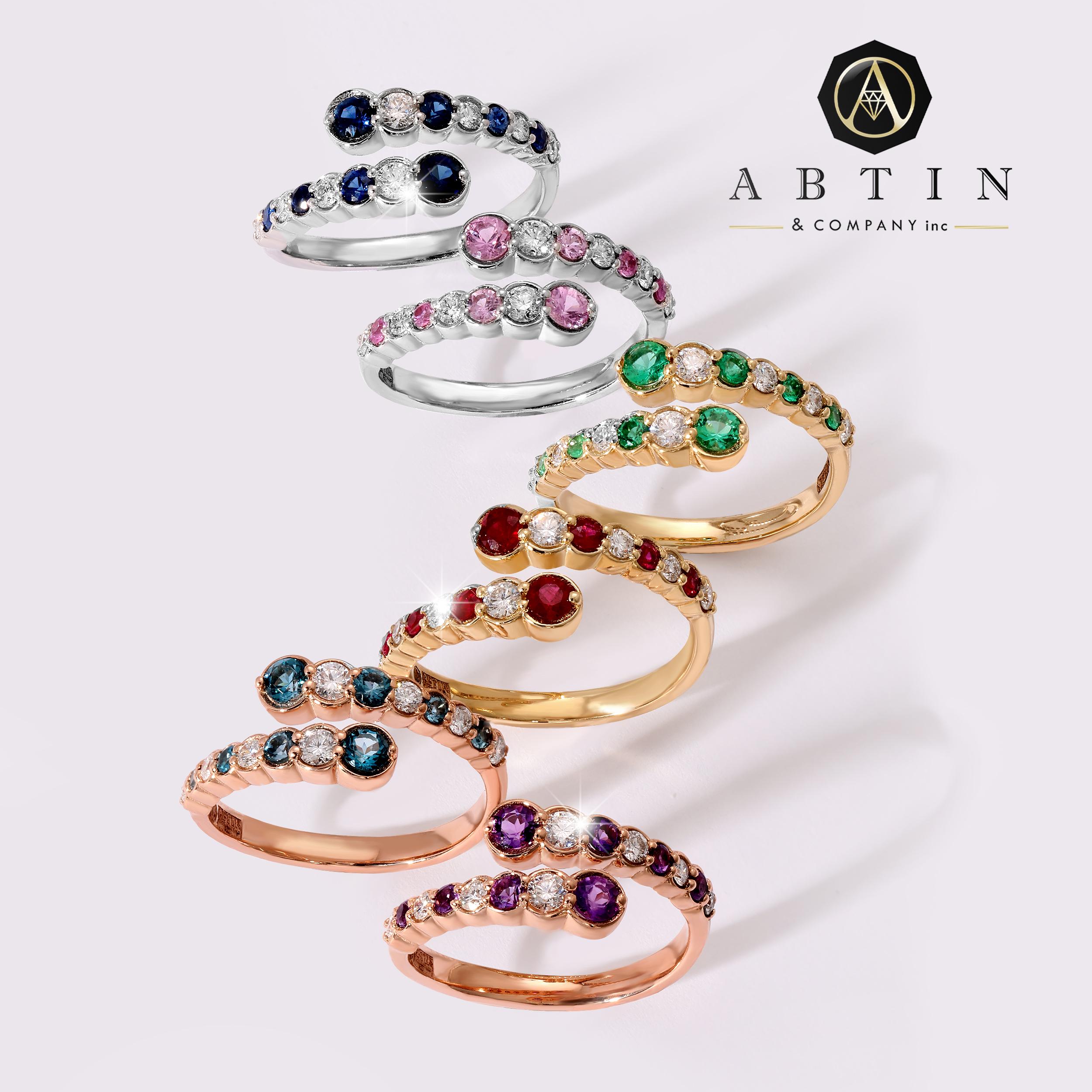 Crafted in 14K gold this ring features a clean and contemporary design. This modern and stylish open bypass alternating ring is set with mesmerizing round-cut diamonds and genuine pink sapphire gemstones. Stack it with your stacking rings or wear it