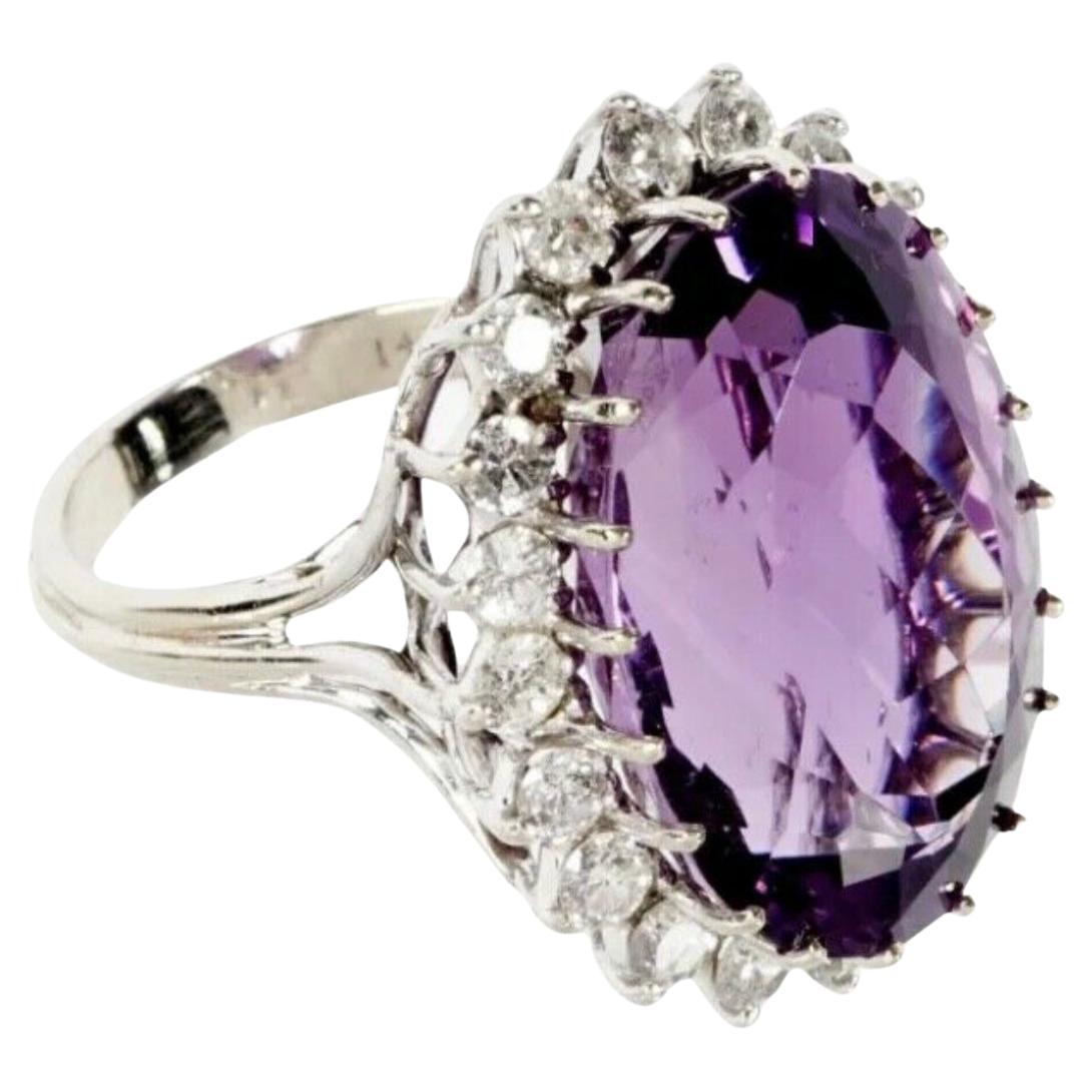 Anillo de oro blanco de 14 quilates con amatista y diamantes