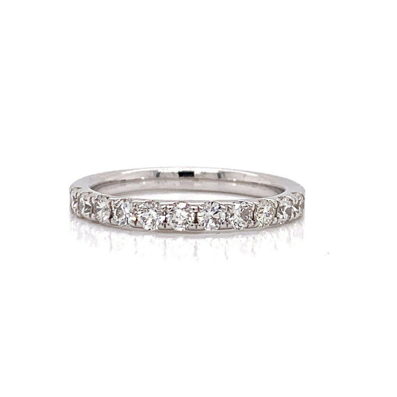 Round Cut 14 Karat White Gold and 0.61 Carat Diamond Wedding Band Ring