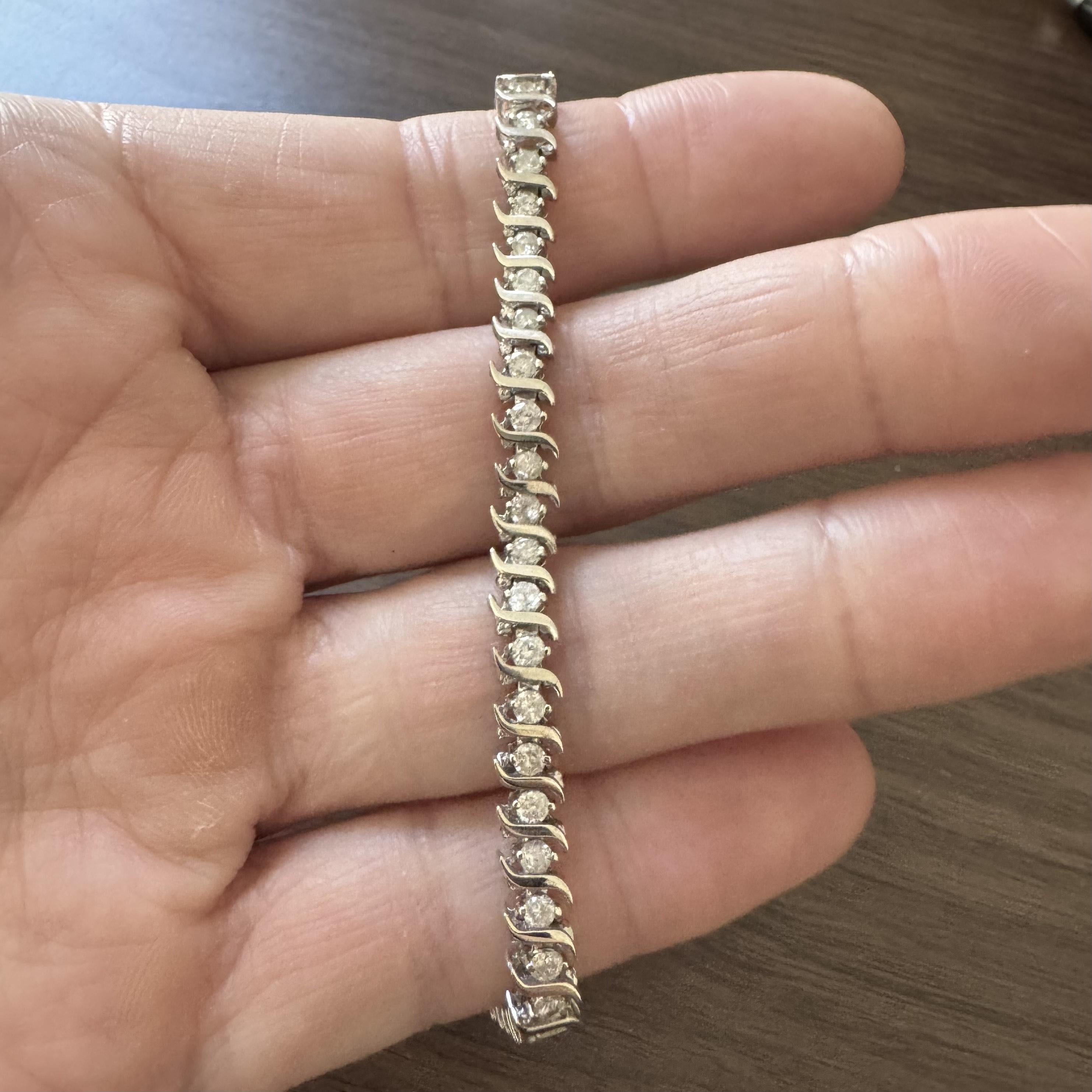 Condition:  Excellent Condition, Professionally Cleaned and Polished
Metal:  14k Gold (Marked, and Professionally Tested)
Weight:  12.2g
Length:  7 Inches
Width:  5mm
Closure:  Box Tab Insert with Safety Latch
Markings:  