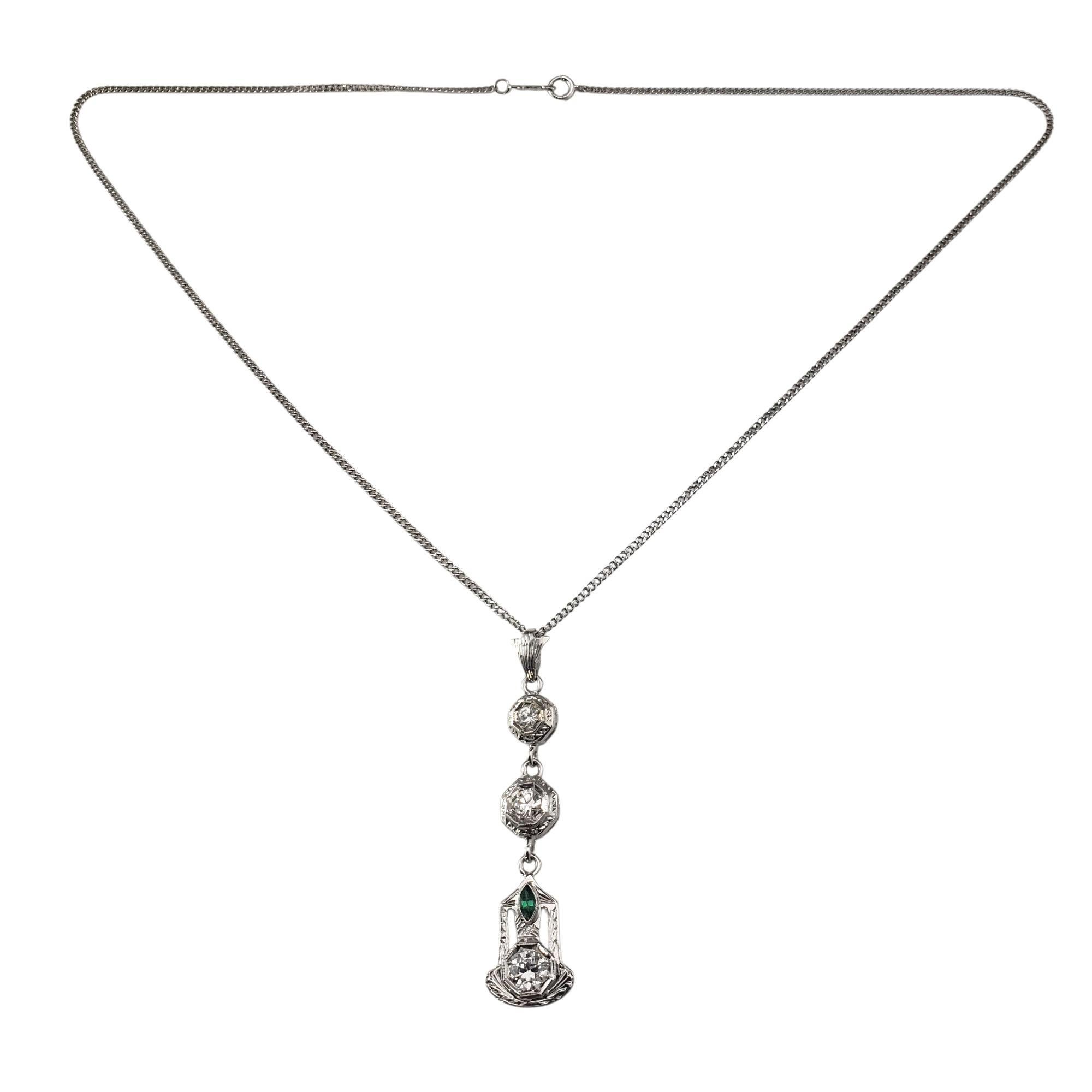 14K White Gold and Diamond Pendant Necklace-

This exquisite 14K white gold pendant showcases a timeless design featuring three round brilliant cut diamonds, each elegantly set in detailed geometric bezels. The drop style arrangement adds graceful