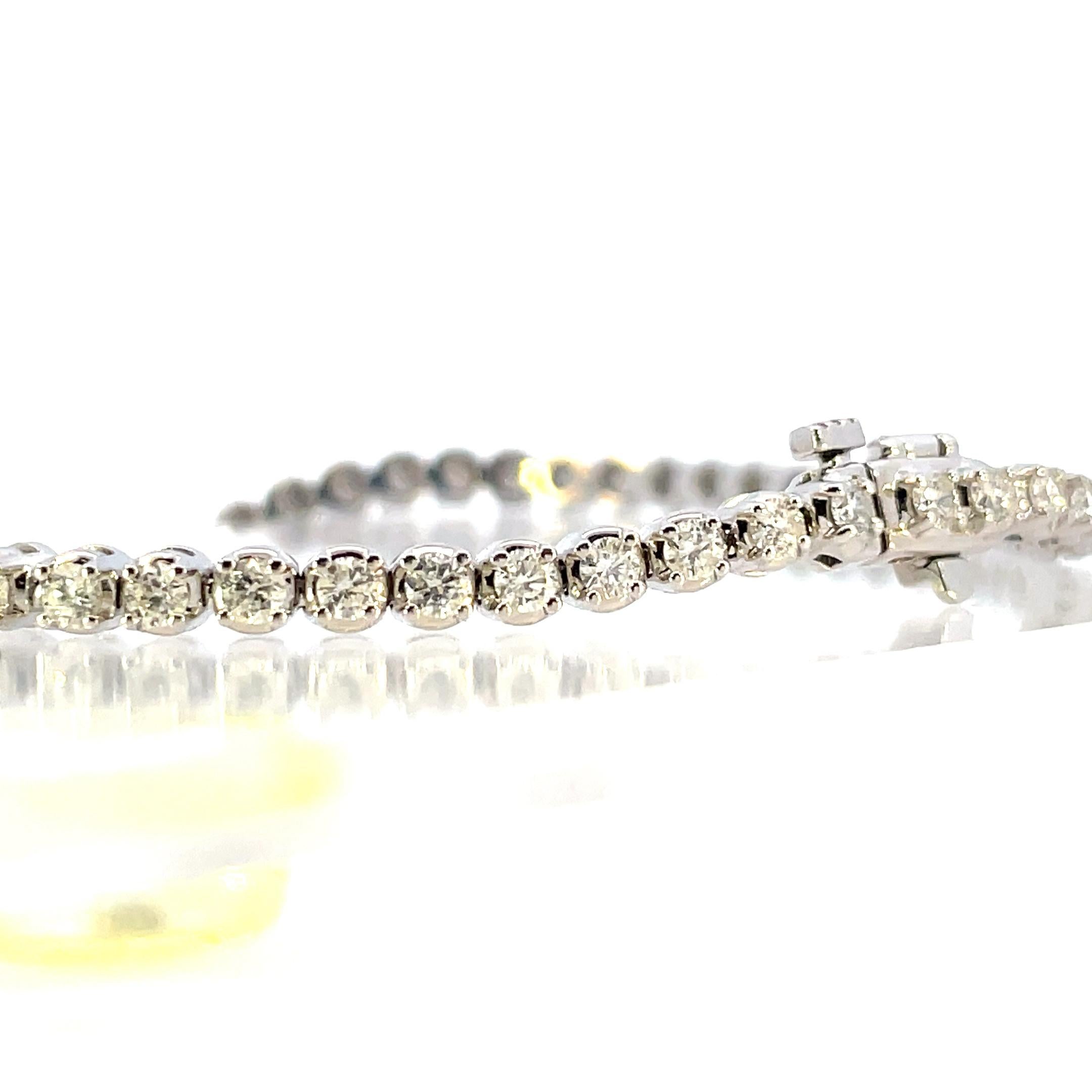 Round Cut 14K White Gold and Diamond Straight Line Tennis Bracelet 2mm For Sale