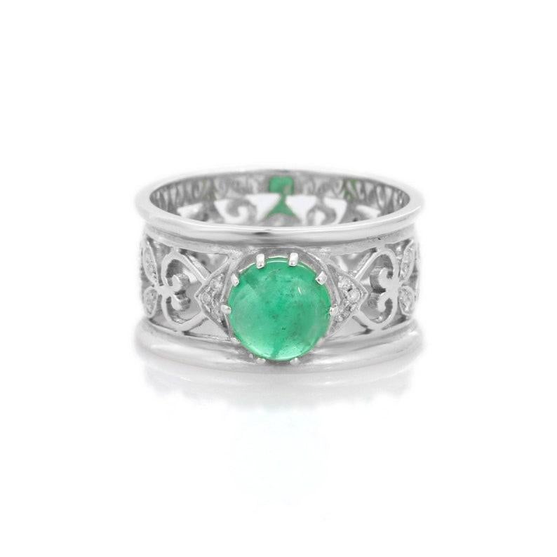 Emerald Filigree Band Ring in 14K Gold featuring natural emerald of 2.01 carat. The gorgeous handcrafted ring goes with every style, every occasion or any outfit. 
Emerald gemstone enhances the intellectual capacity of the person.
Designed with