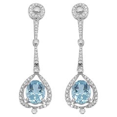 14K White Gold Aquamarine and Diamond Dangle Earring. Style#E5199AQ