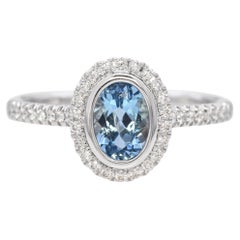 14k Weißgold Halo-Ring mit Aquamarin und Diamant