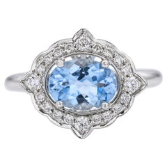 Anillo Halo de Aguamarina y Diamante en Oro Blanco de 14k