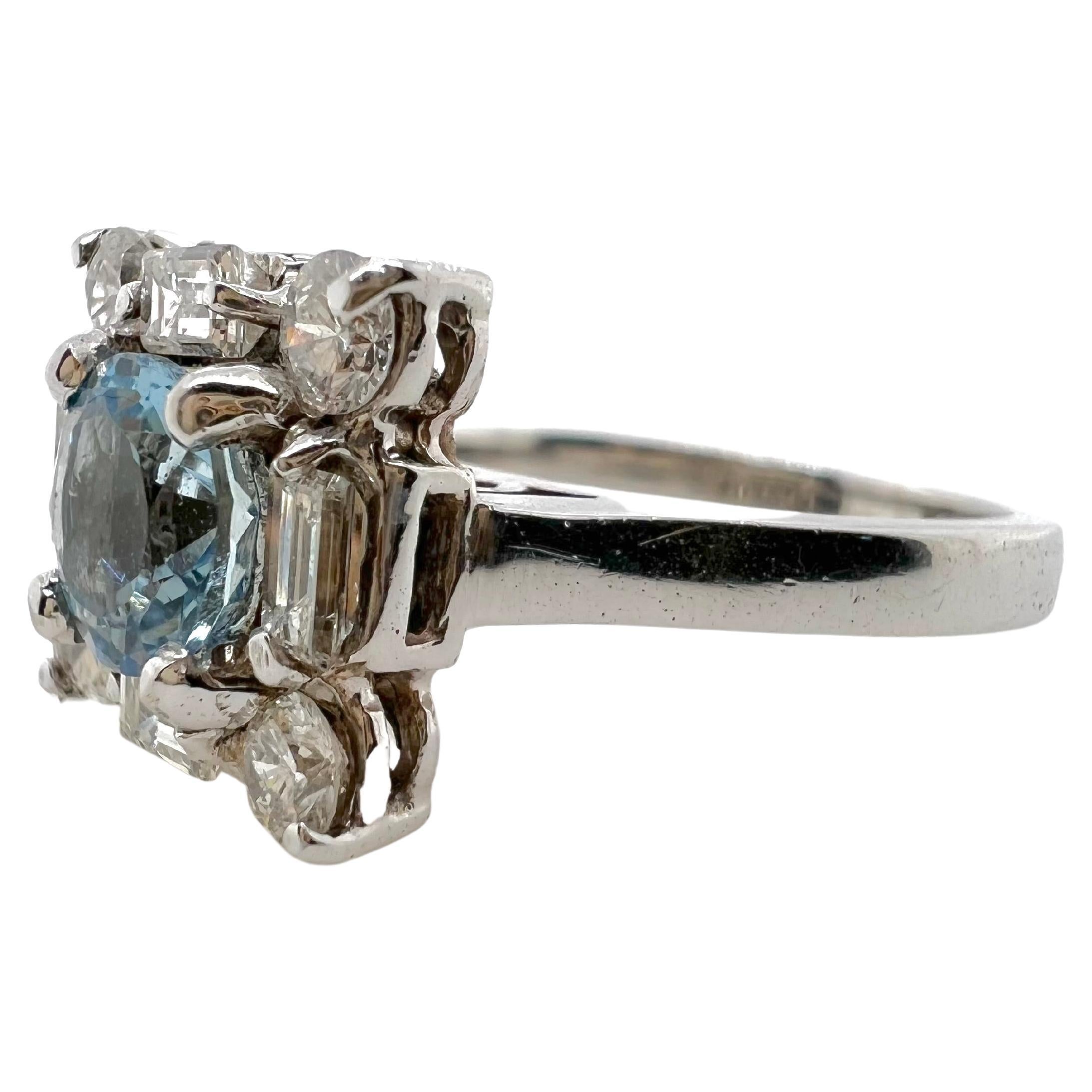 Gorgeous aquamarine!  This vibrant crisp blue hue aquamarine is set in a 14k white gold mounting with baguette and round diamonds.  This seawater color blue, is eye-catching. 


Size: 5.5
Stone: Aquamarine 0.75 ct
Diamonds: 0.80 ct total