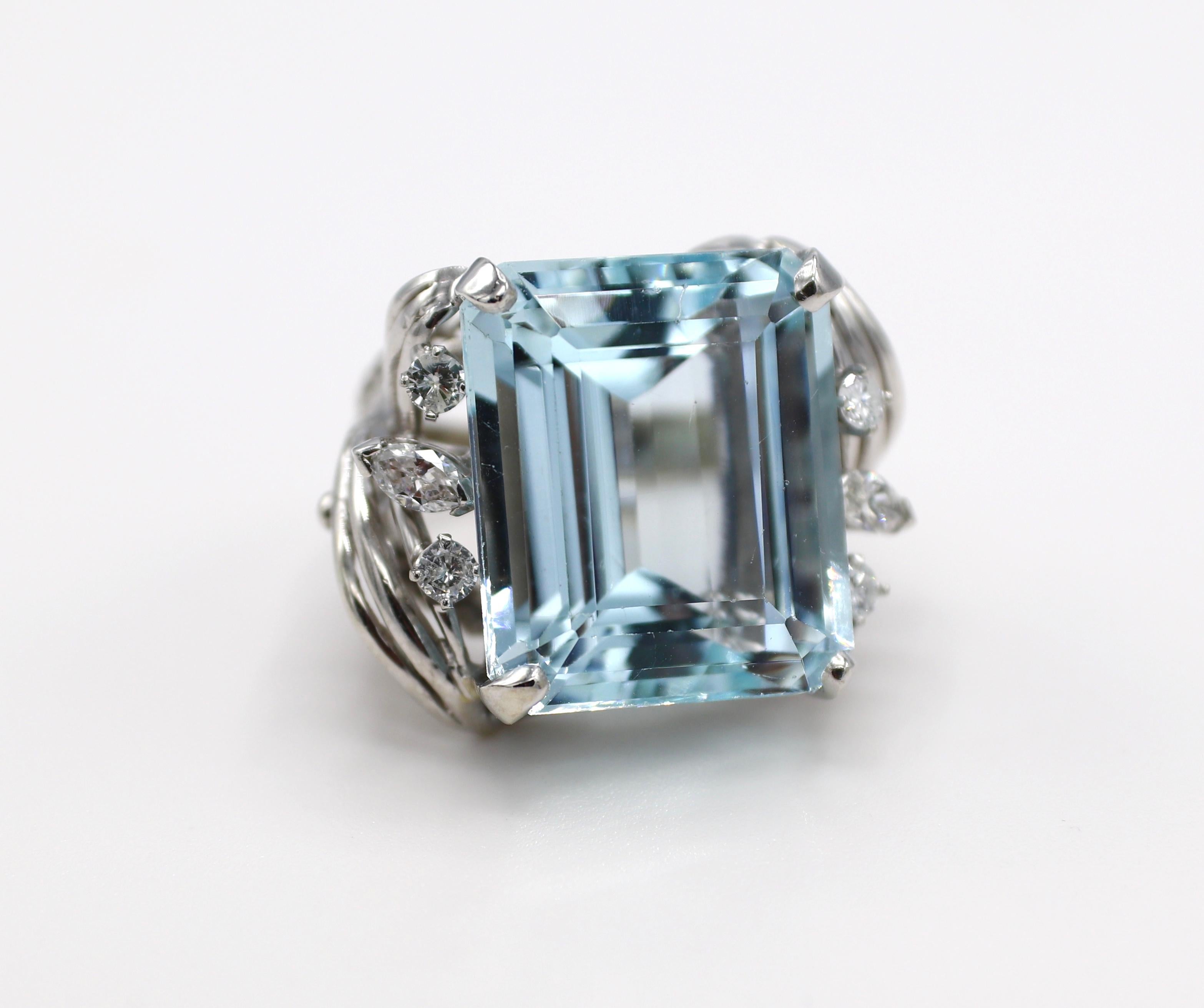 14K White Gold Aquamarine & Diamond Cocktail Ring Size 7

Metal: 14k white gold
Weight: 21.8 grams
Aqua: 21.2 x 18 x 12.2, approx. 33 carats 
Diamonds: Approx. .80 CTW G VS 
Size: 7 (US)
Top of ring measures approx. 23mm x 30mm 
Band is 3.5mm at