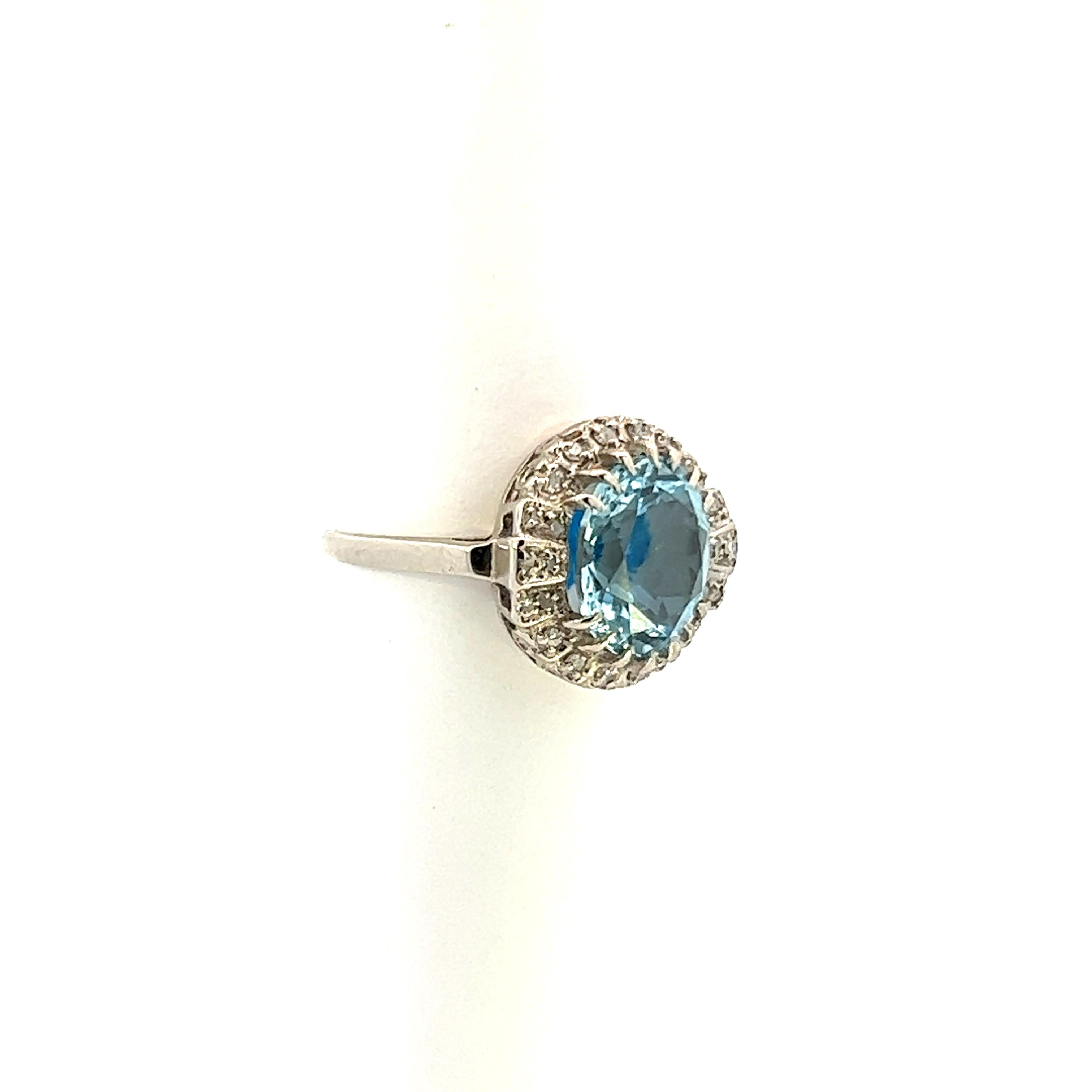 This 14k white gold aquamarine and diamond contemporary cocktail ring is spectacular. The uniqueness of the ring comes from the combination of the aquamarine, diamond and white gold; all creating a natural wonder. The center stone is a gorgeous 3.57