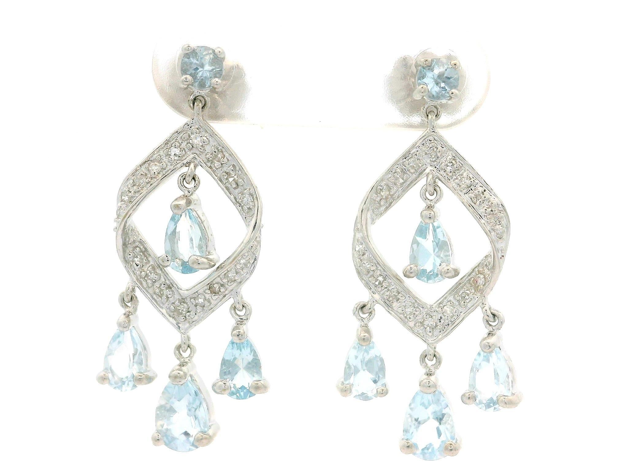 --Pietre: --
(36) Diamanti naturali autentici - taglio singolo - incastonati - colore bianco - 0,10ctw (circa)
(10) Acquamarine naturali autentiche - 8 con taglio a pera e 2 con taglio rotondo - incastonate - colore blu cielo - 3 mm (rotonde), 5x3