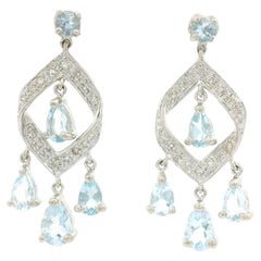 Orecchini pendenti con diamante e acquamarina in oro bianco 14k