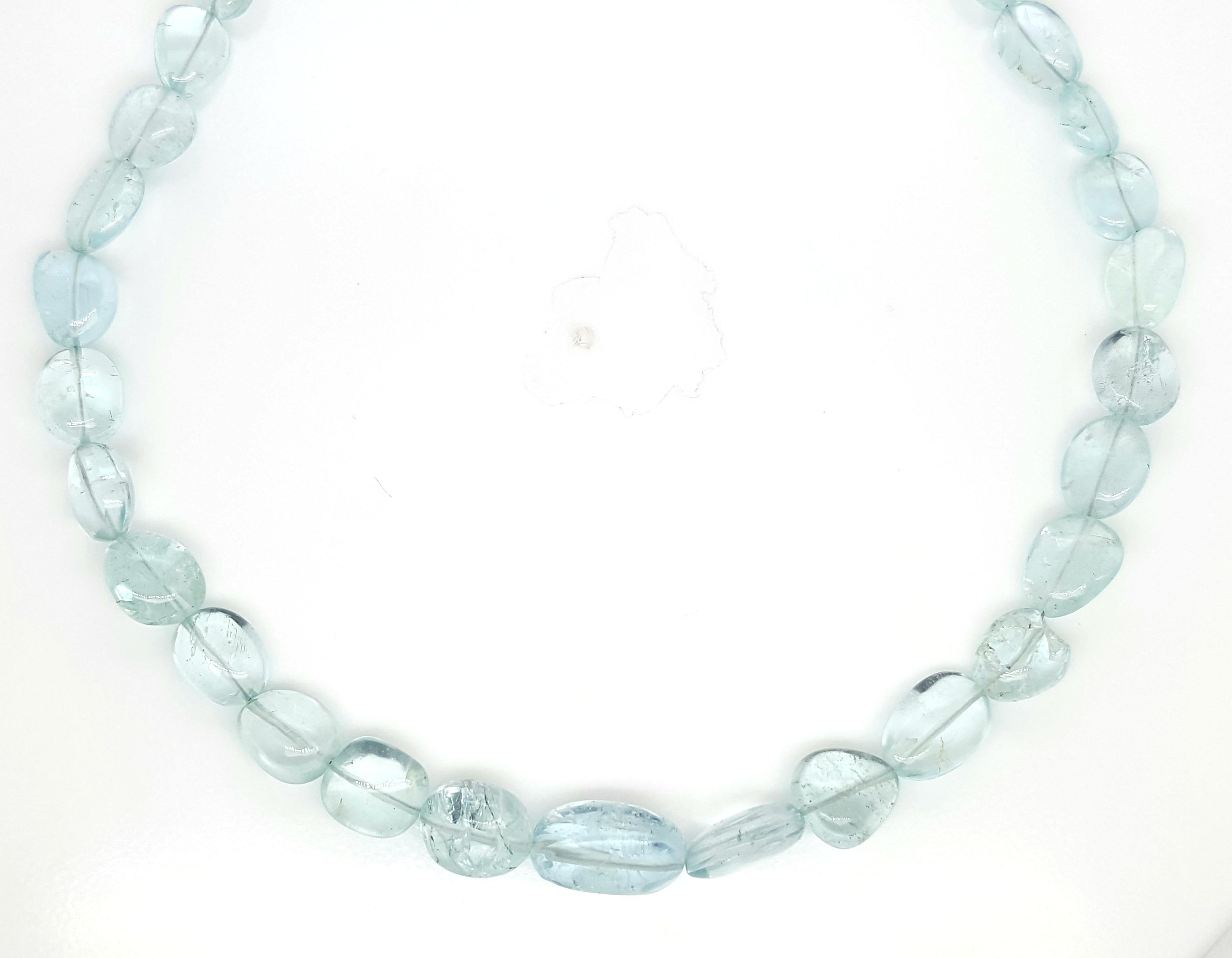  Aquamarine Nuggets Beaded Necklace is absolutely divine. The aquamarine beads range in size from 6.45 mm to 12.8 mm in diameter. Every bead in the necklace is natural aquamarine. The colors are very bright and lively that  blend beautifully