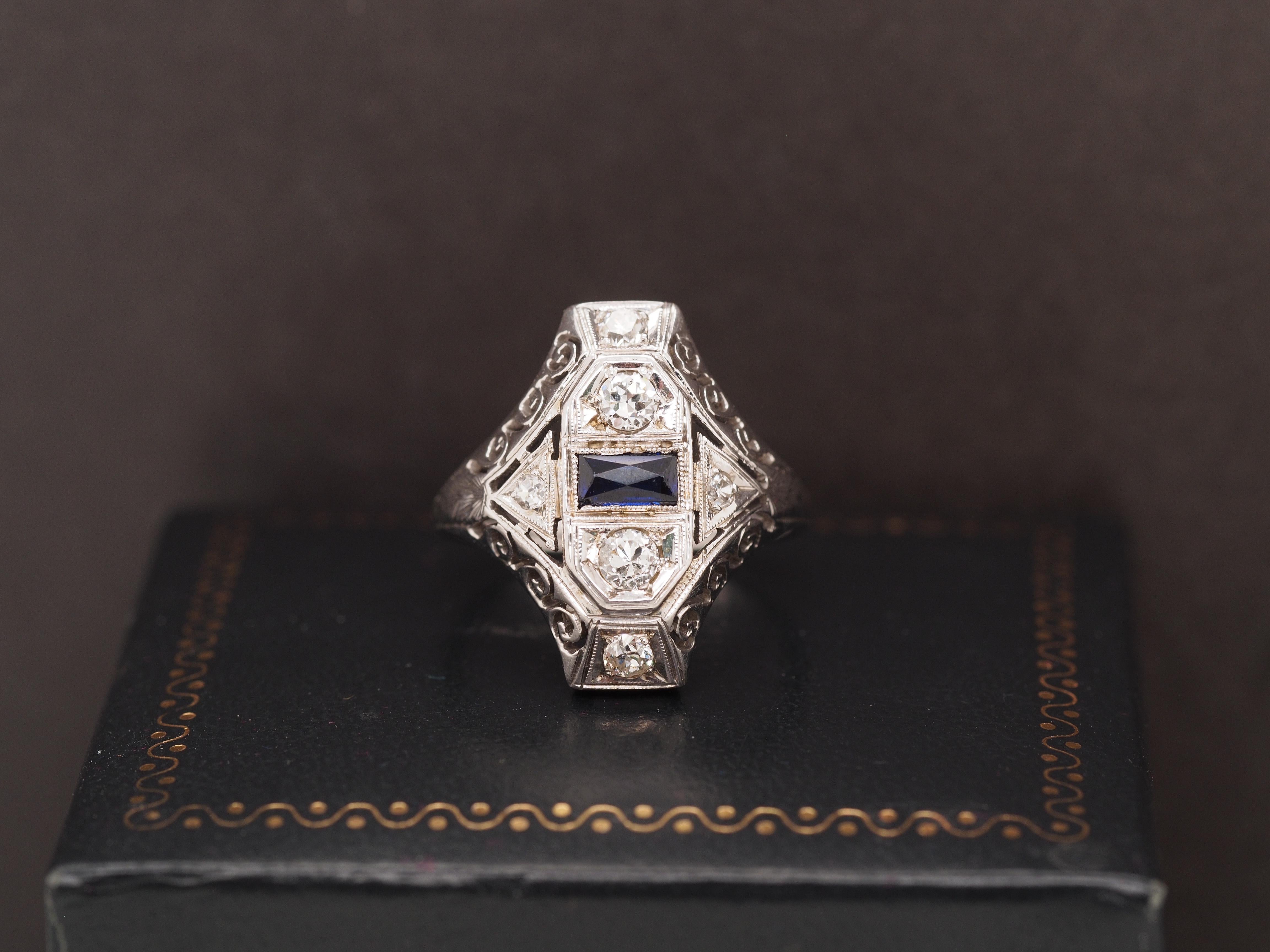 Year: 1920s
Item Details:
Ring Size: 6.75
Metal Type: 14K White Gold [Hallmarked, and Tested]
Weight: 4.1 grams
Diamond Details: .40ct, total weight. Natural Diamonds. SI clarity, G Color, Old European Brilliant
Side Stone Details: French Cut